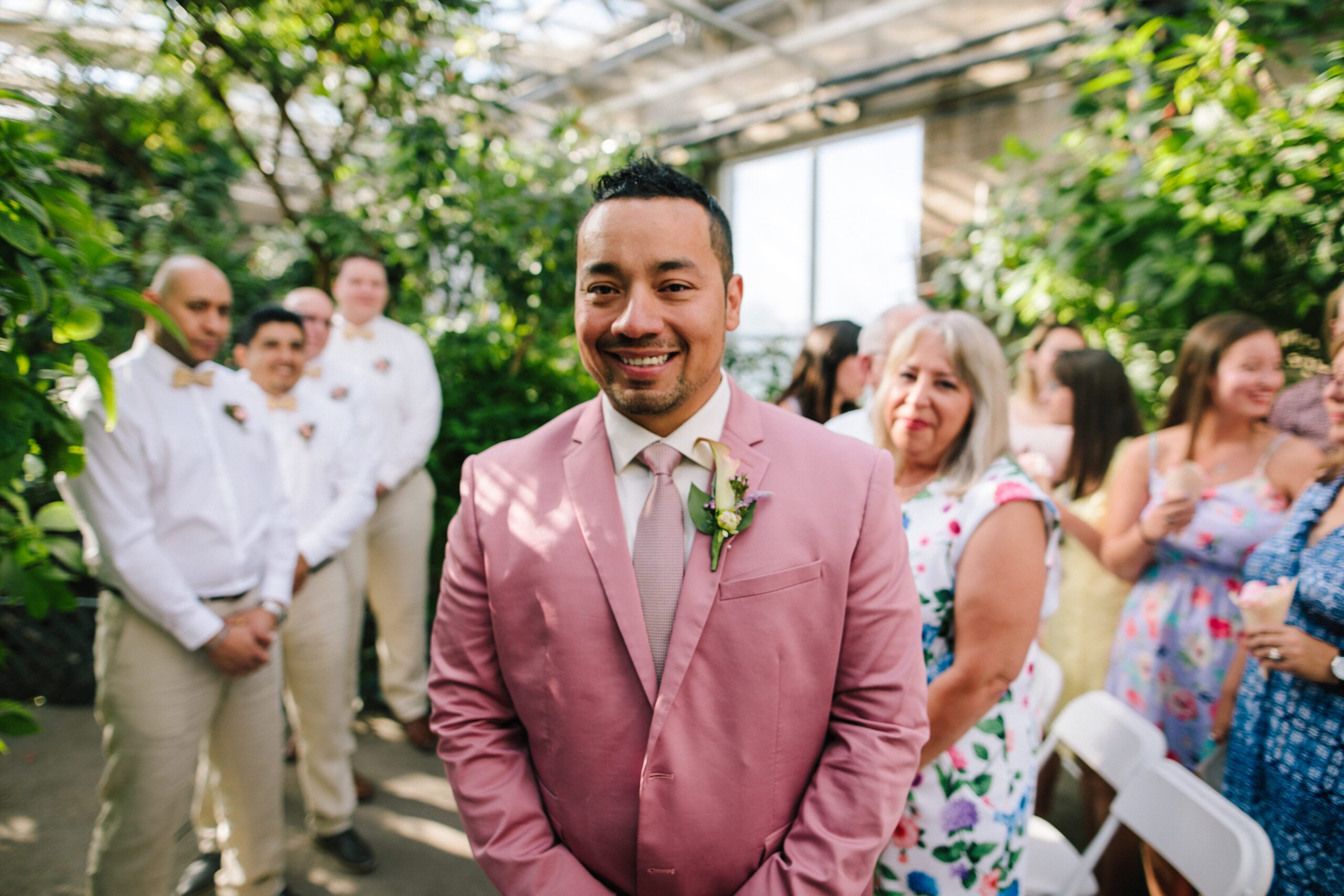 The groom after seeing his bride for the first time on the altar at their Butterfly Pavilion wedding. 