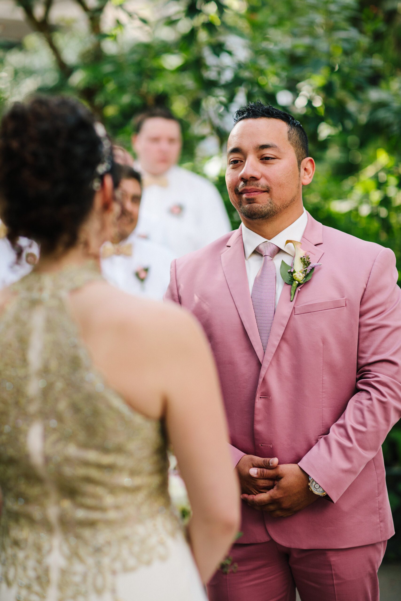 The groom looking sweetly at his beautiful bride during their Butterfly Pavilion wedding.