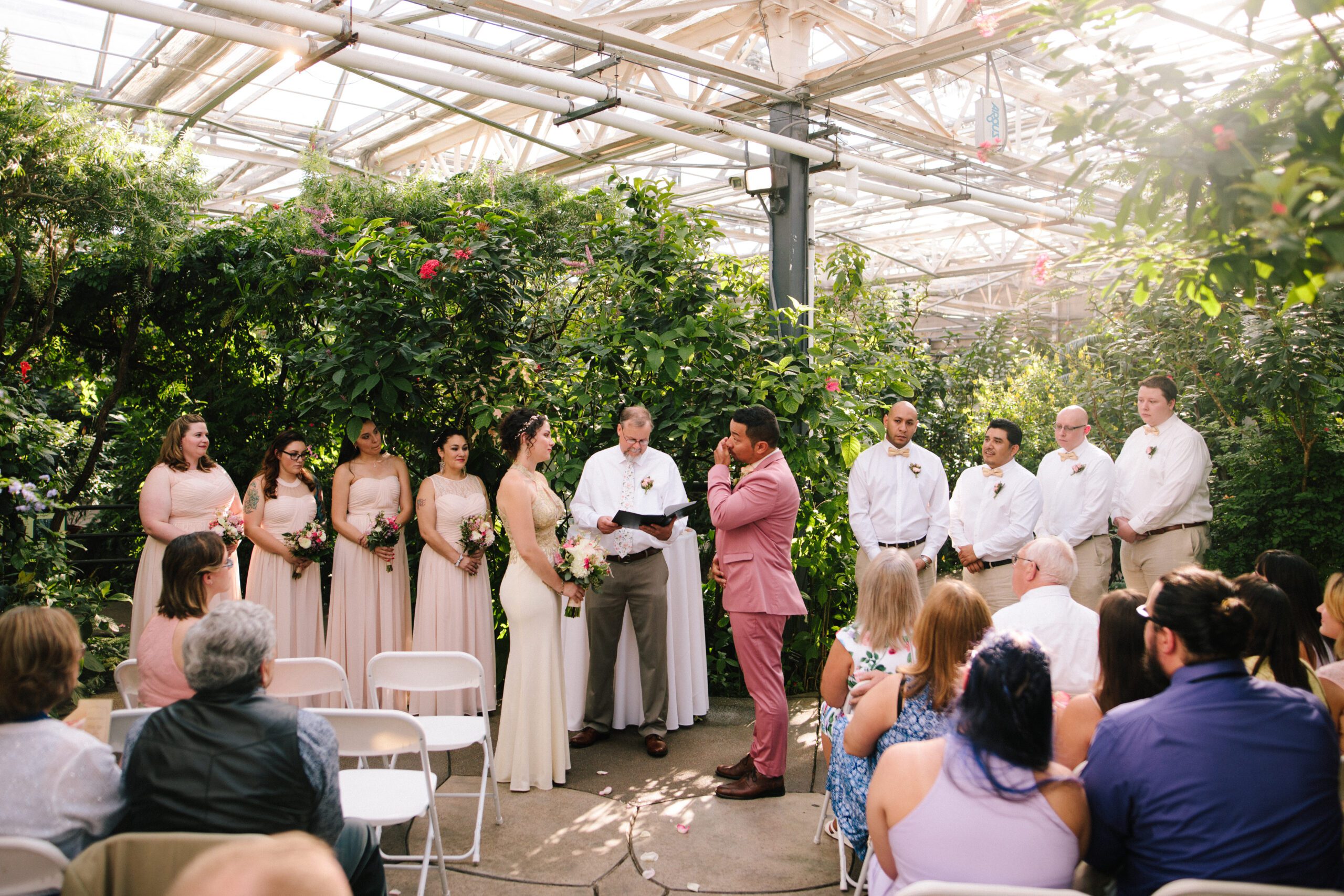 A beautiful portrait of the entire wedding party during their Butterfly Pavilion wedding.