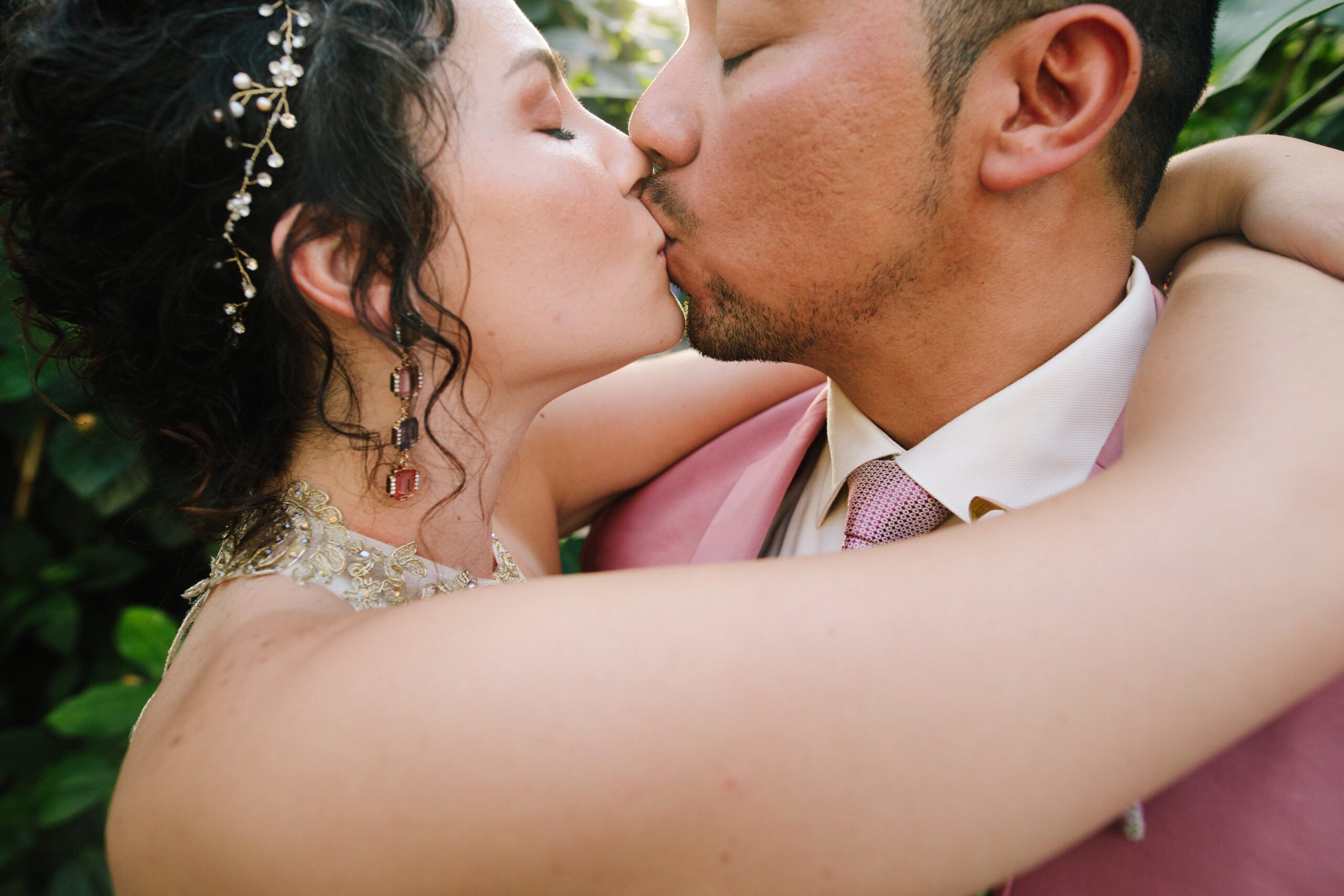 An upclose shot of the bride and groom kissing at their Butterfly Pavilion Wedding. ⁠