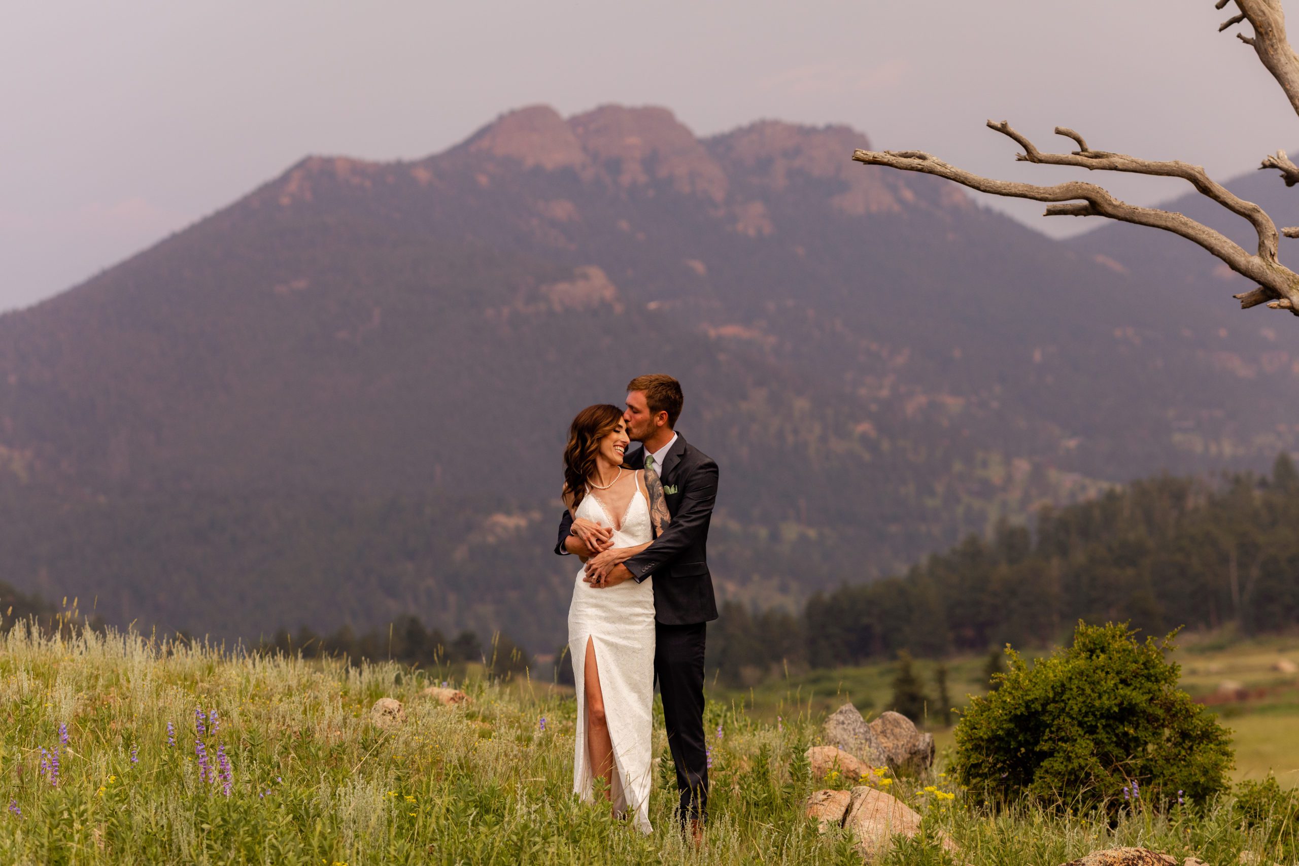 Bride and groom eloped to Rocky Mountain National Park in Colorado with the Moraine Mountain Range as their backdrop