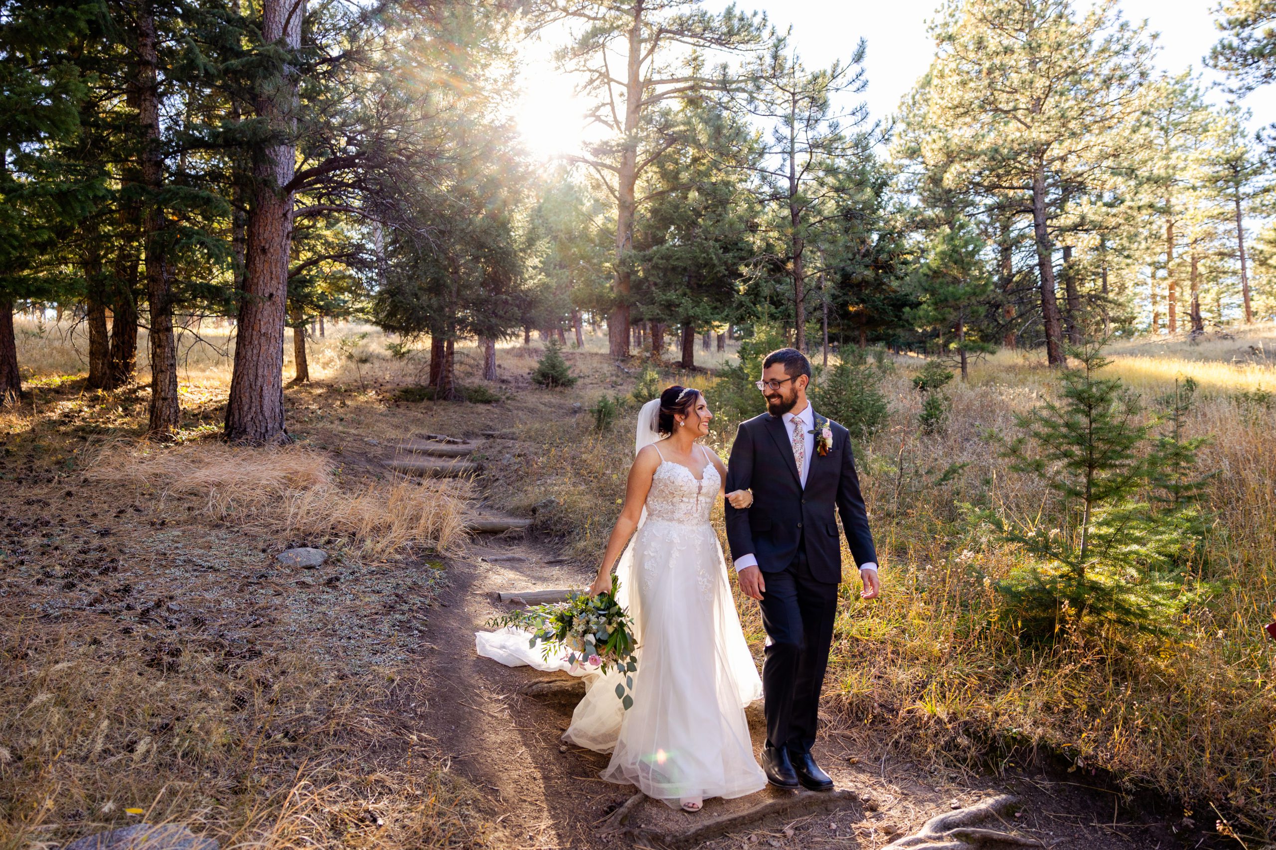 Bride and Groom hiking on flagstaff Mountain in Boulder