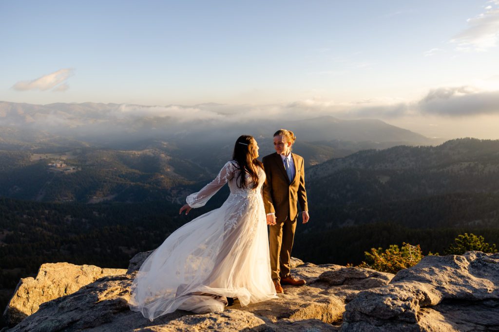 Bride and groom at sunrise elopement Lost Gulch in Boulder Colorado