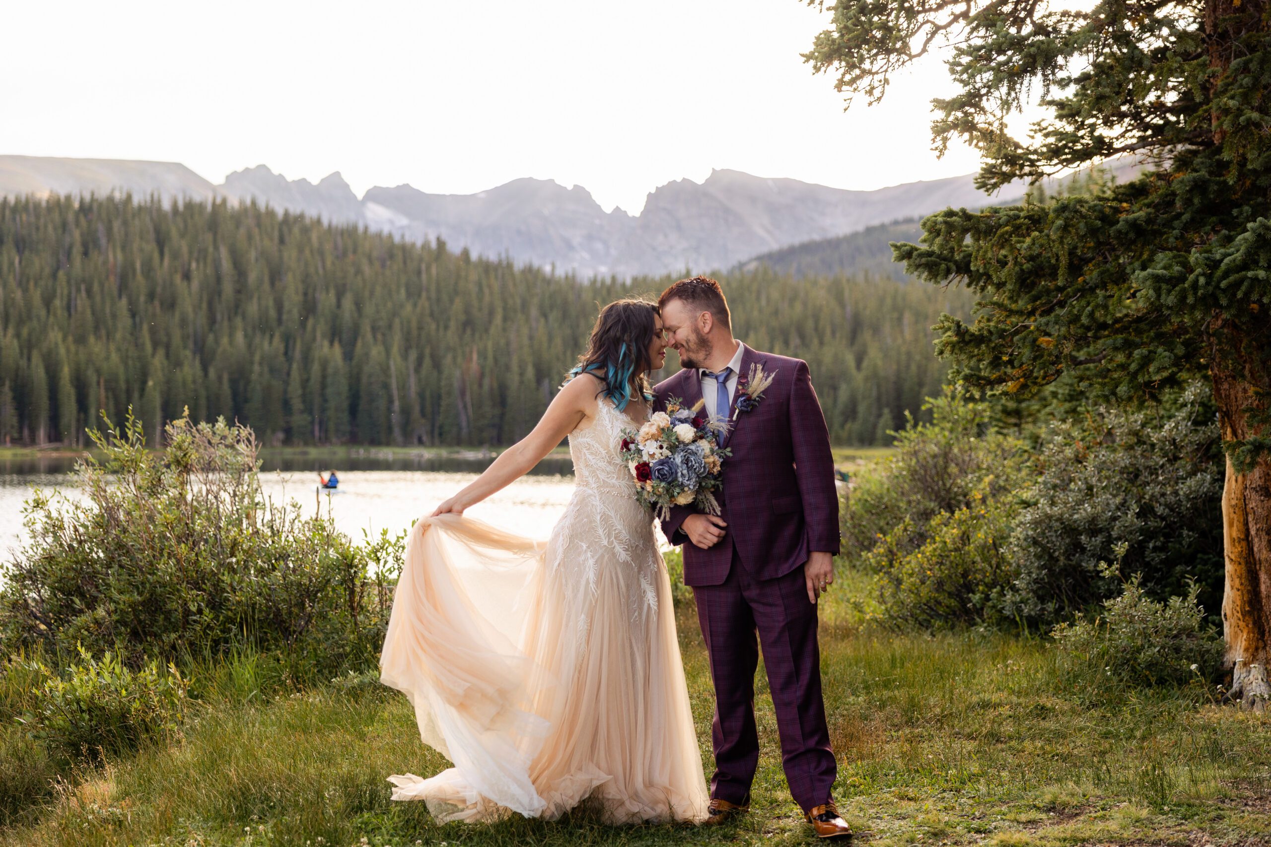 the bride and groom nose to nose near the lake at their Brainard Lake Elopement. 