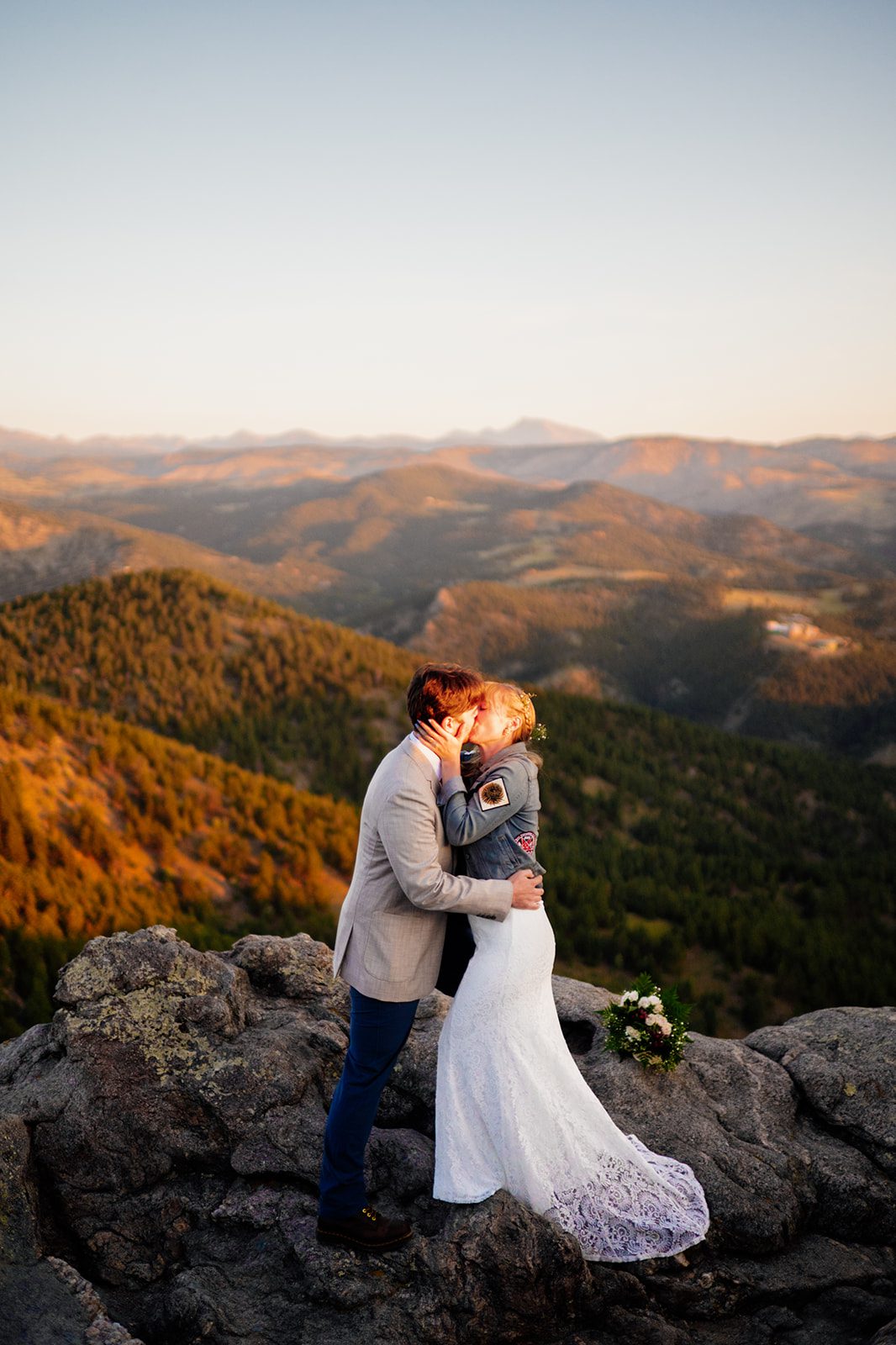 Officially kiss as husband and wife at their Lost Gulch Overlook elopement. 