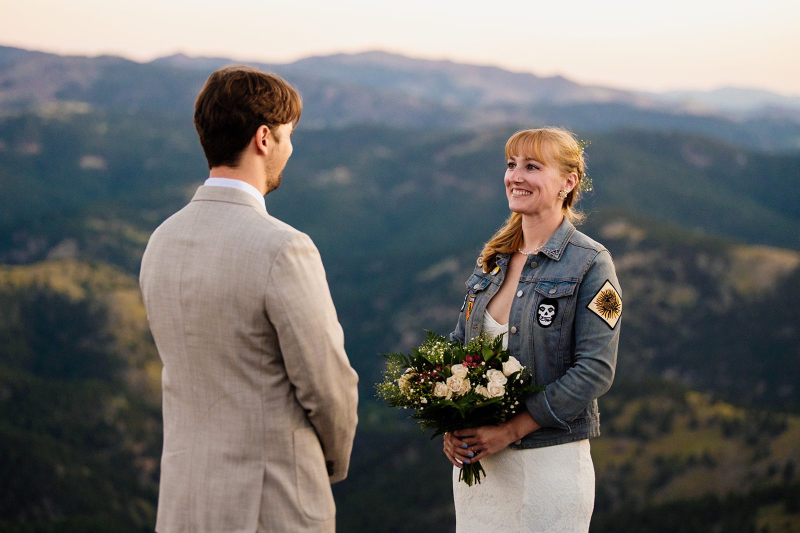 Bride smiling during her sunrise elopement at Lost Gulch Overlook