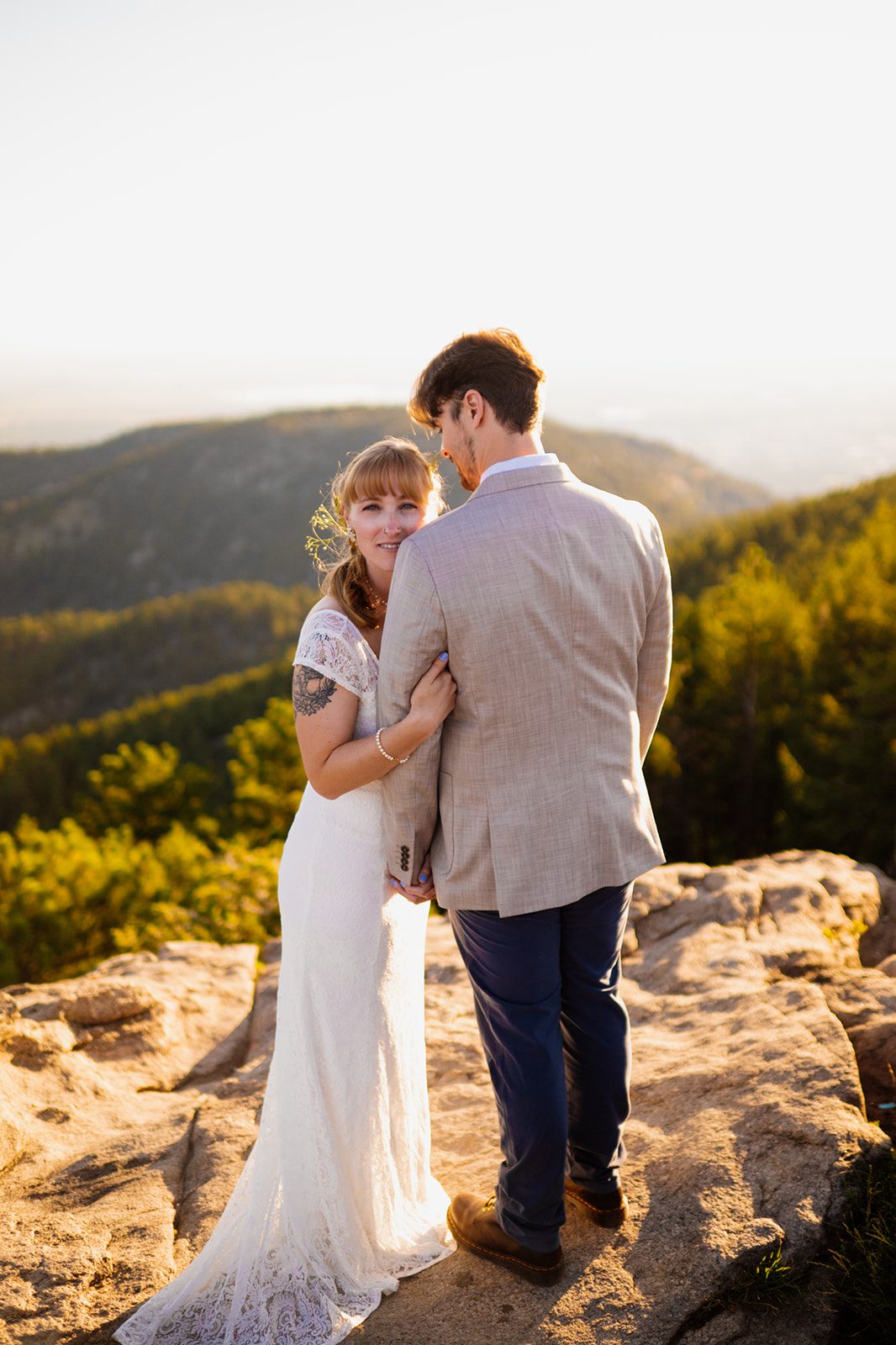 bride facing the camera, smiling after their Lost Gulch Overlook elopement ceremony. 