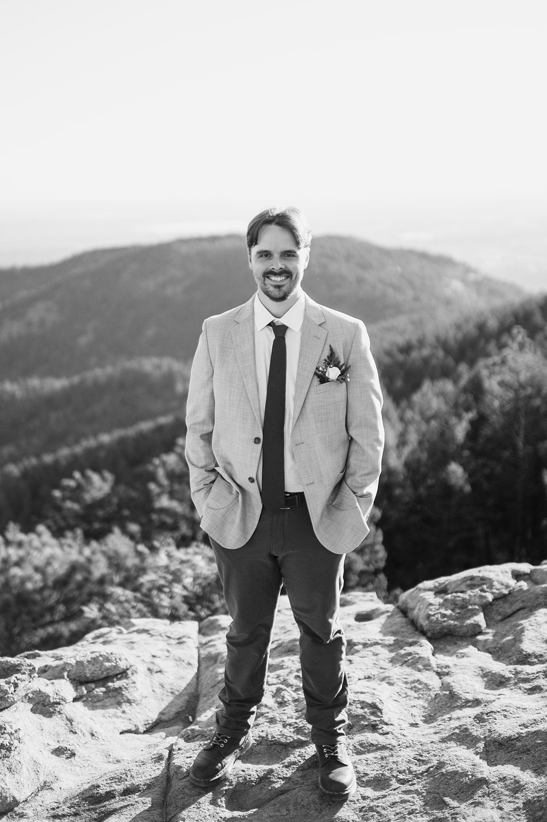black and white photo of groom at Lost Gulch Overlook