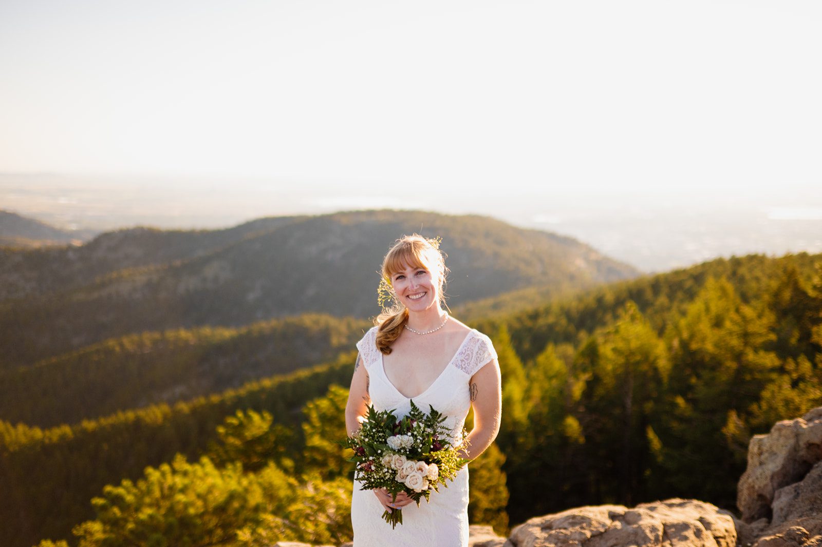 bride at Lost Gulch Overlook for sunrise elopement ceremony. 