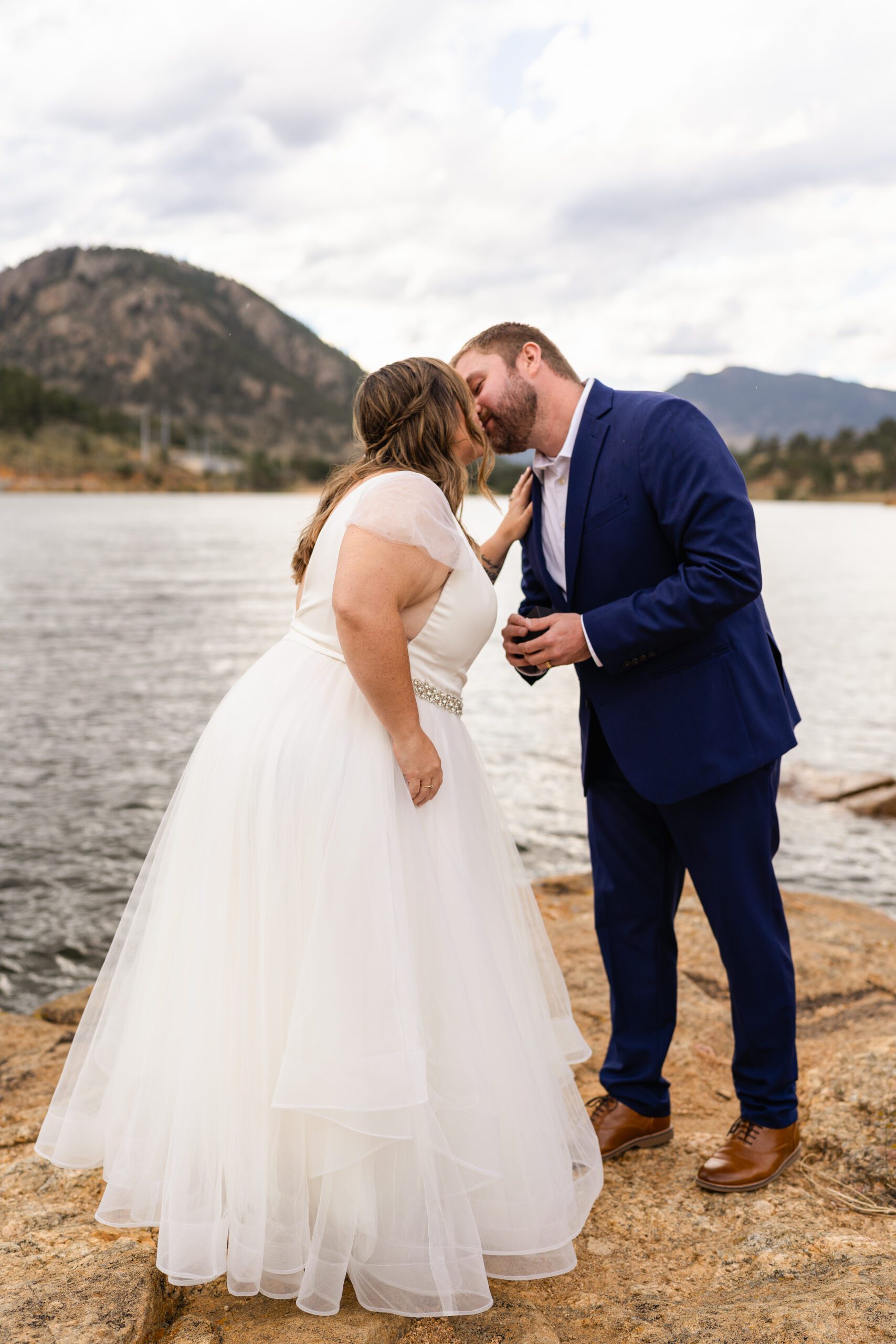 The bride and groom kiss at their Bear Lake elopement. 