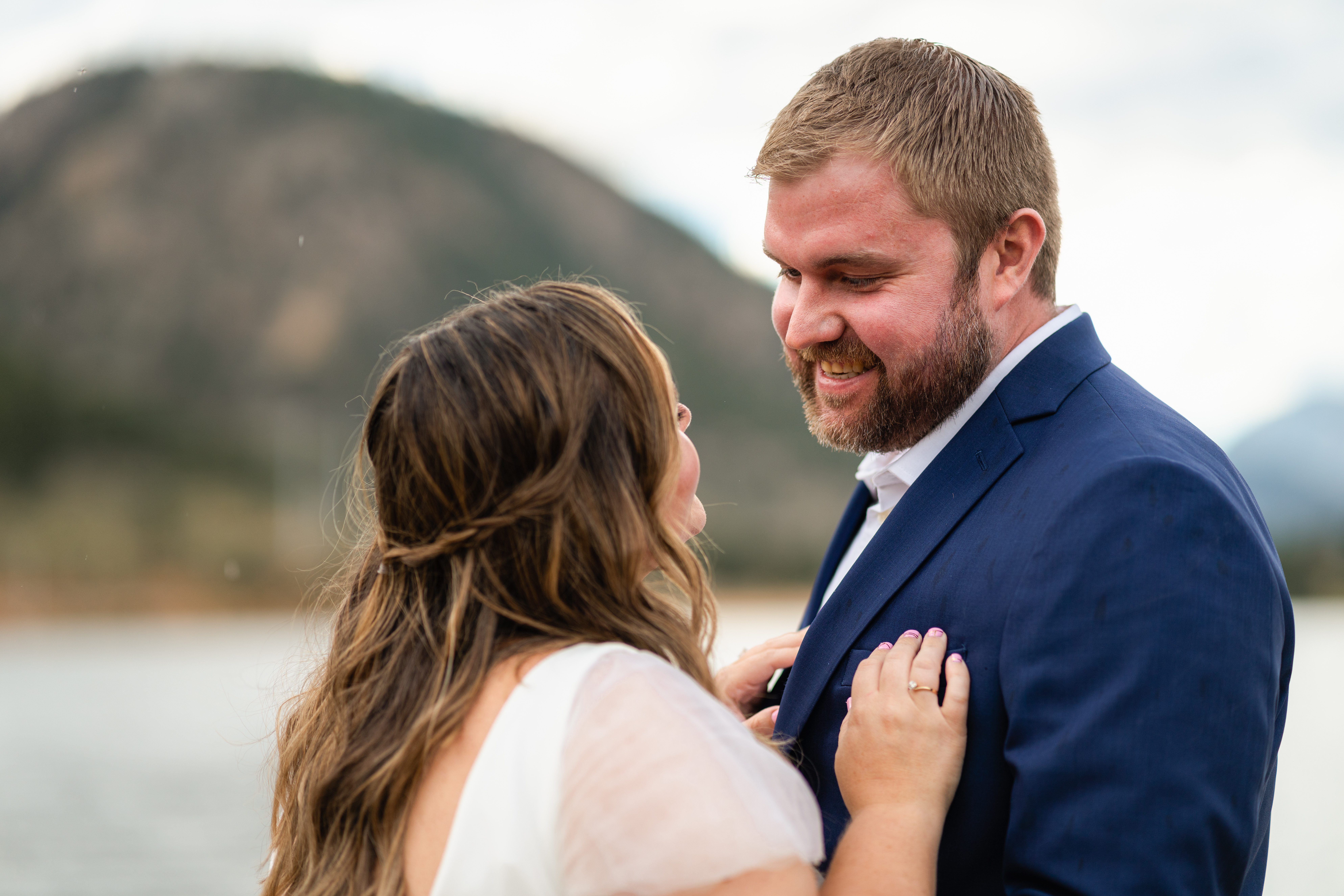 the bride and groom looking sweetly at each other during their Bear Lake elopement. 