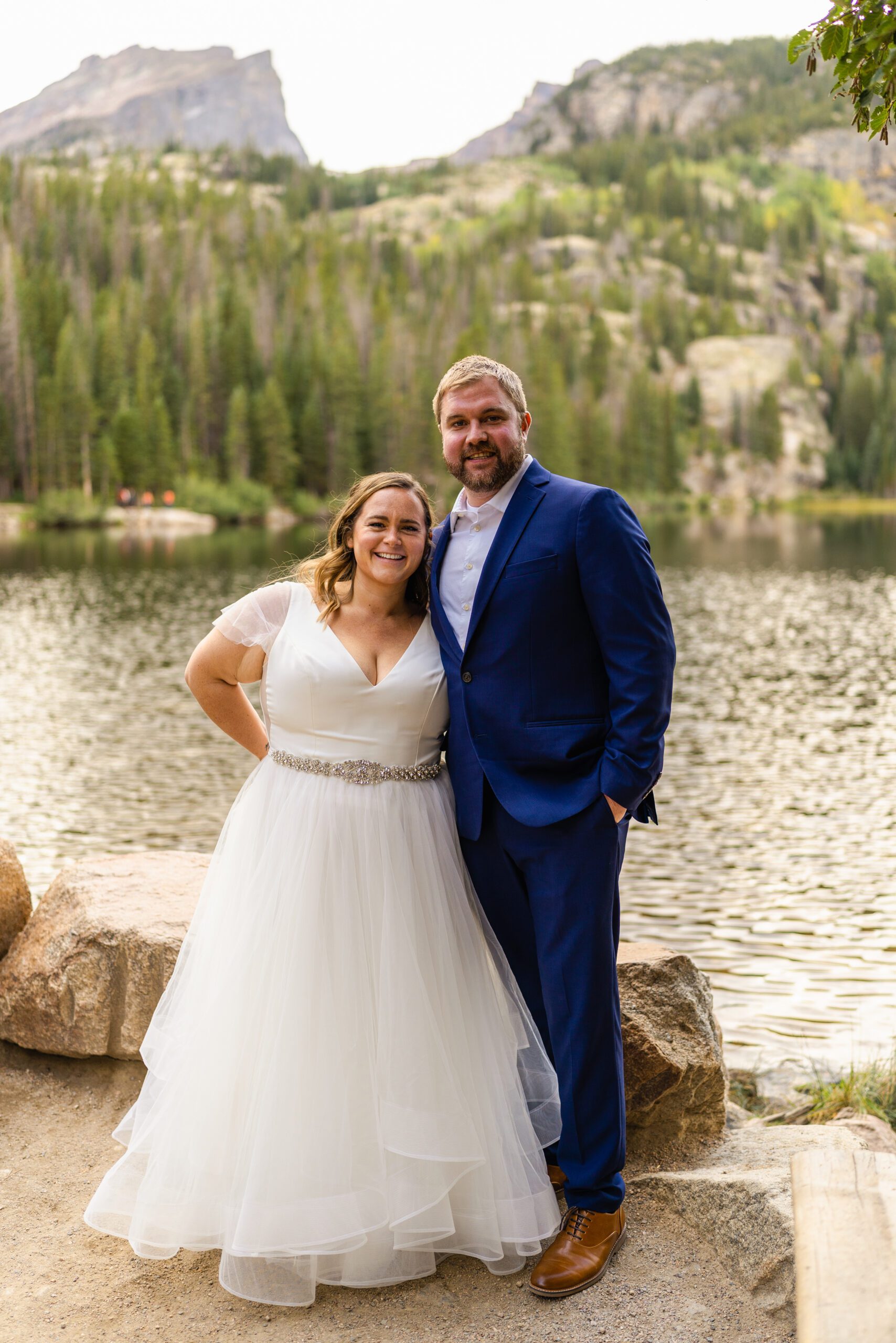 the bride and groom by the lake at their Bear Lake elopement. 