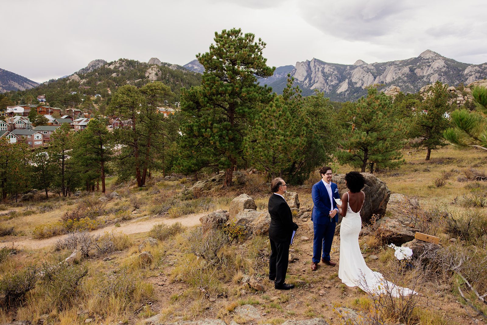 Knoll Willows Elopement with rocky mountains in the distance. 