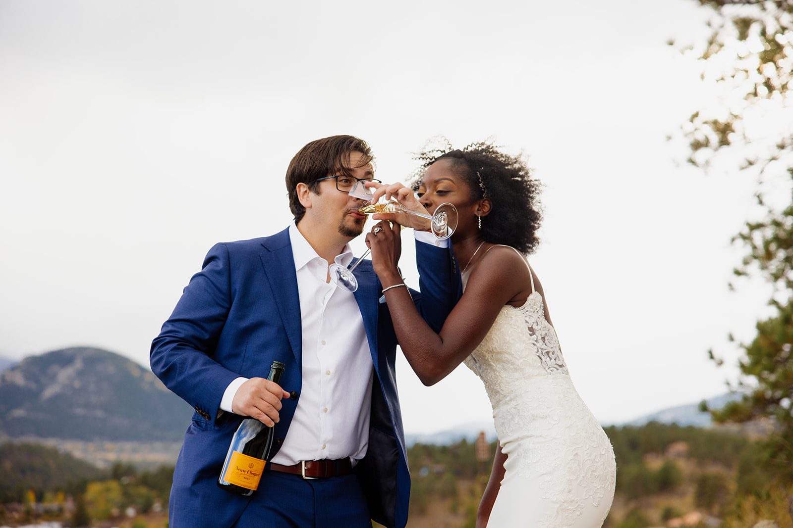 bride and groom drinking champagne together, after Knoll Willows Elopement ceremony. 