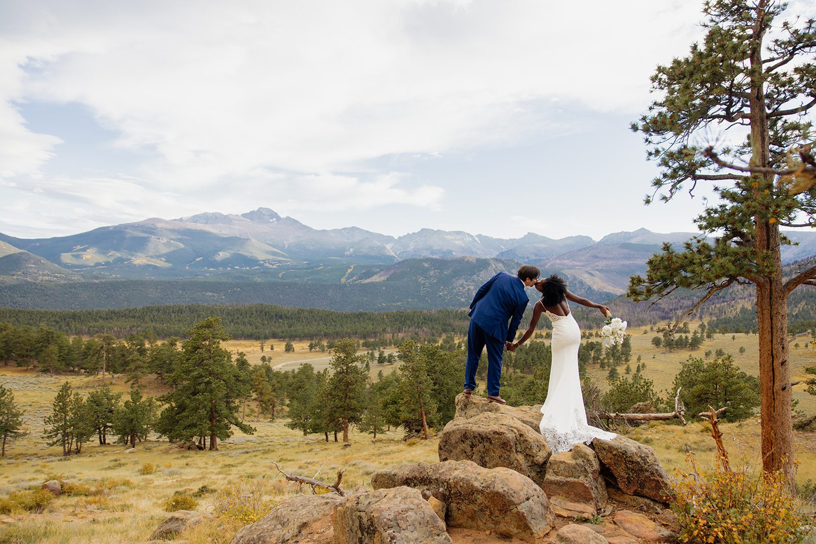 Newley weds kissing at Rocky National Park after their Knoll Willows Elopement ceremony. 