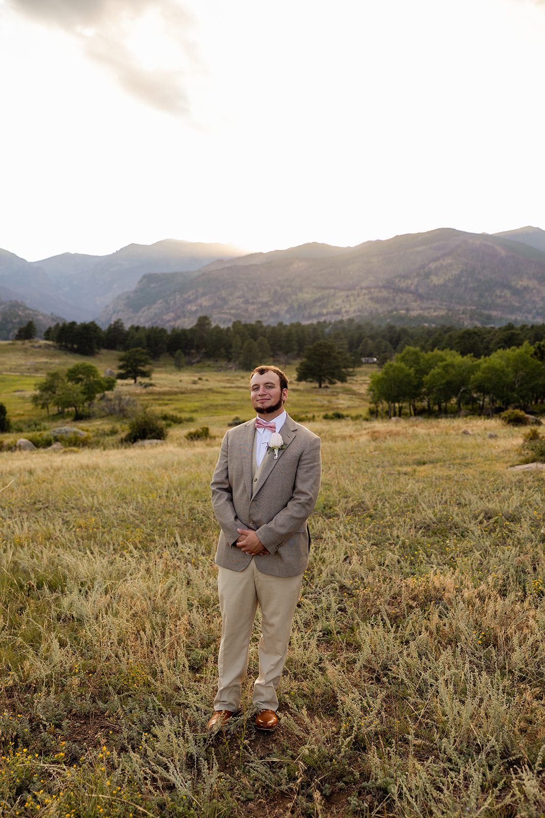 The groom in a meadow. 