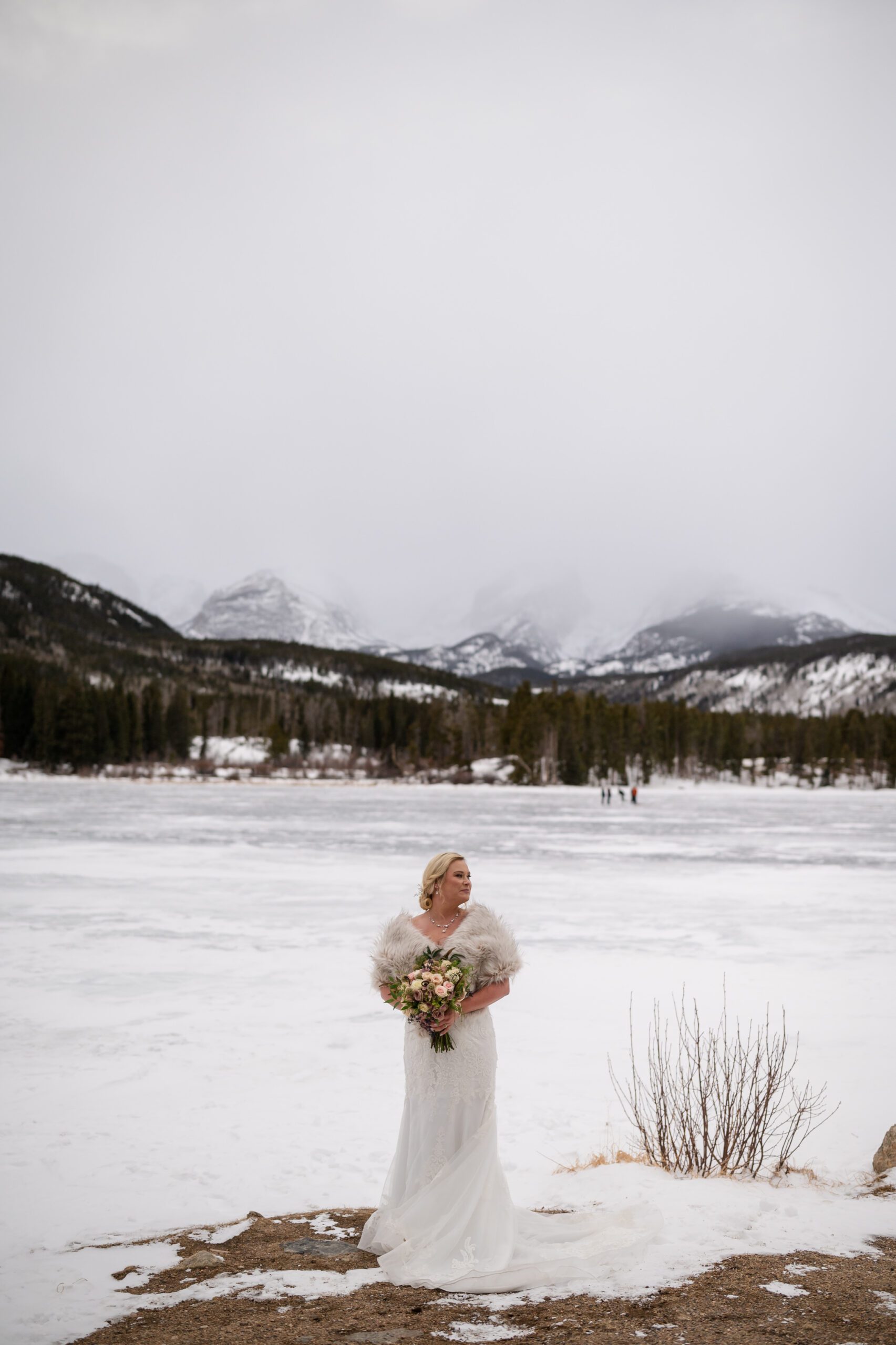 A beautiful bride on her elopement day at her Winter Elopement at Sprague Lake. 