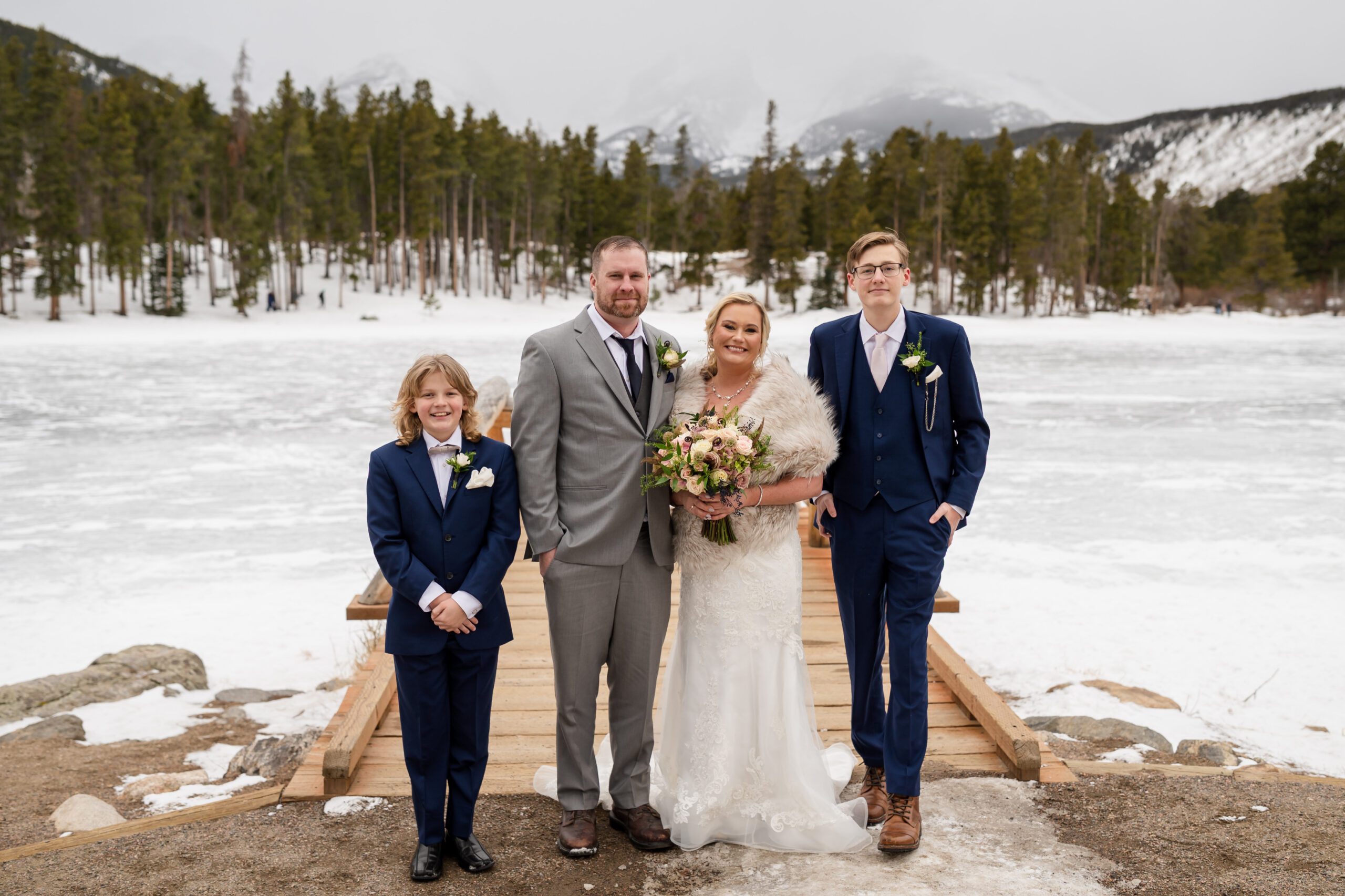 a group shot of the family during thier Winter Elopement at Sprague Lake. 
