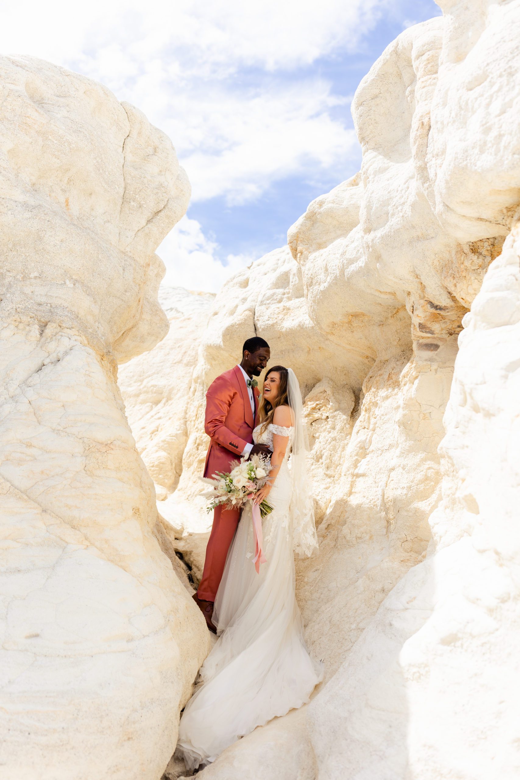 Bride and groom explore the Paint Mines before their elopement at the Garden of the Gods
