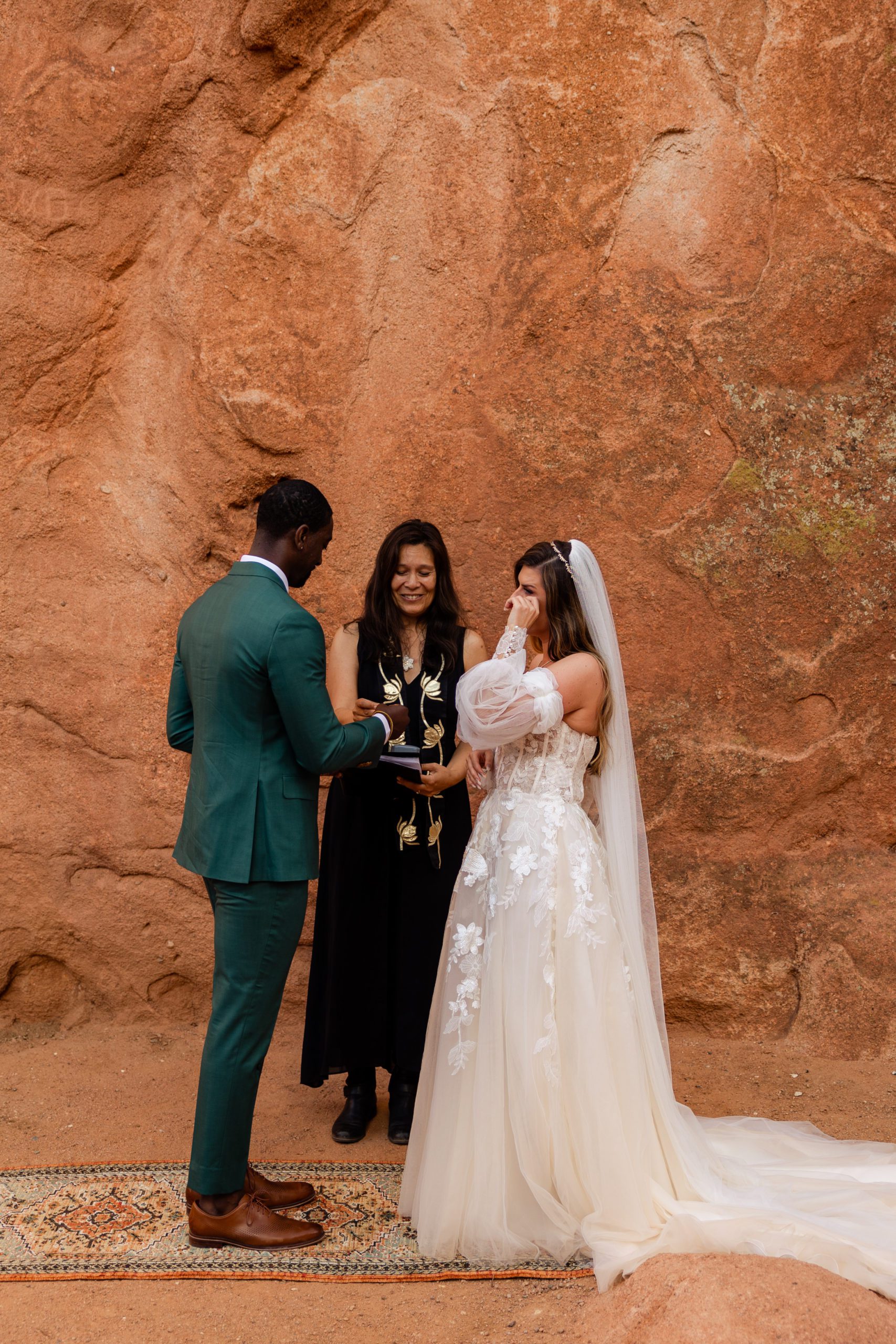 Bride cries tears of joy during their elopement at the Garden of the Gods
