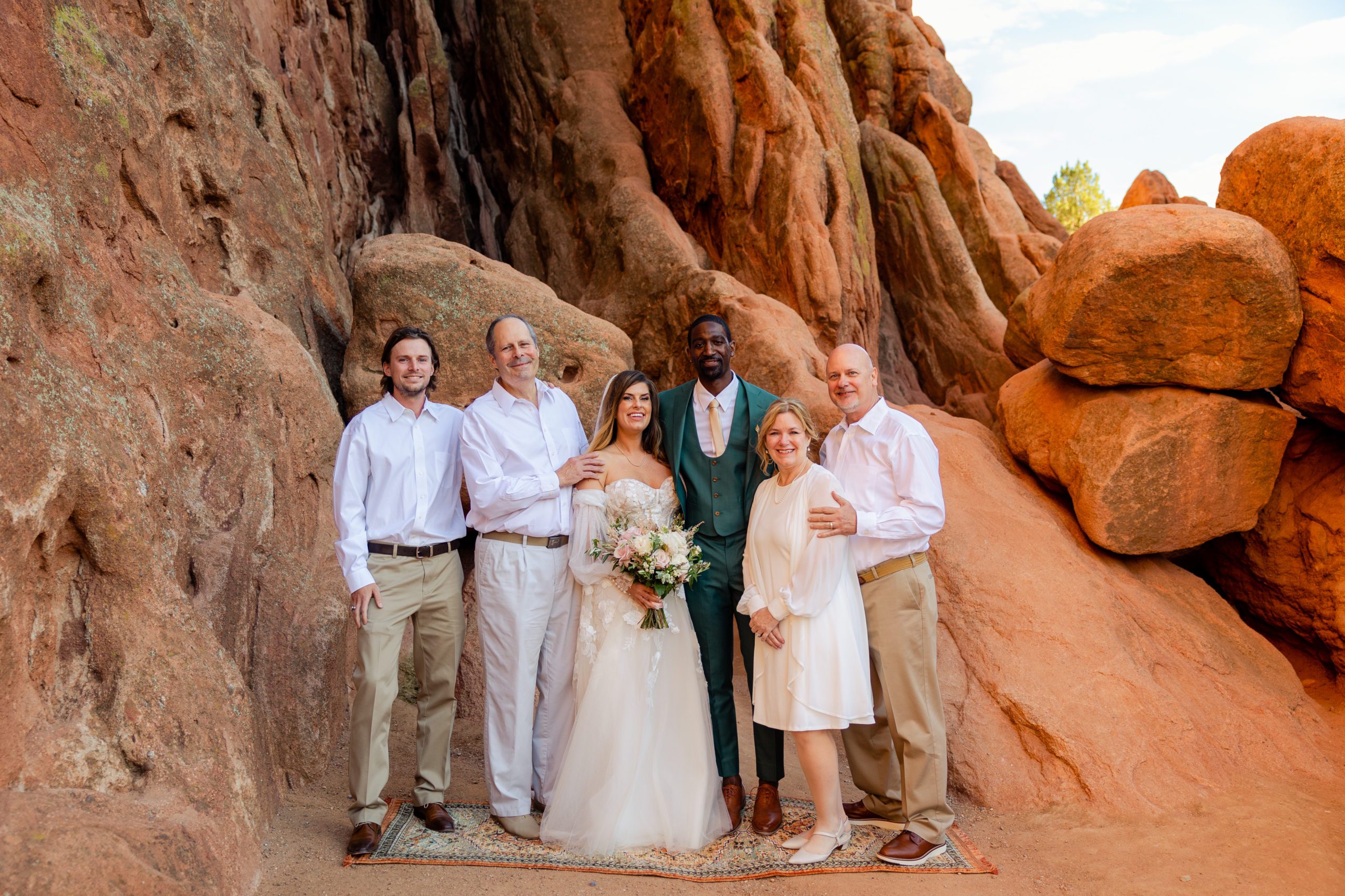 A family portrait with the bride's family at the Garden of the Gods.