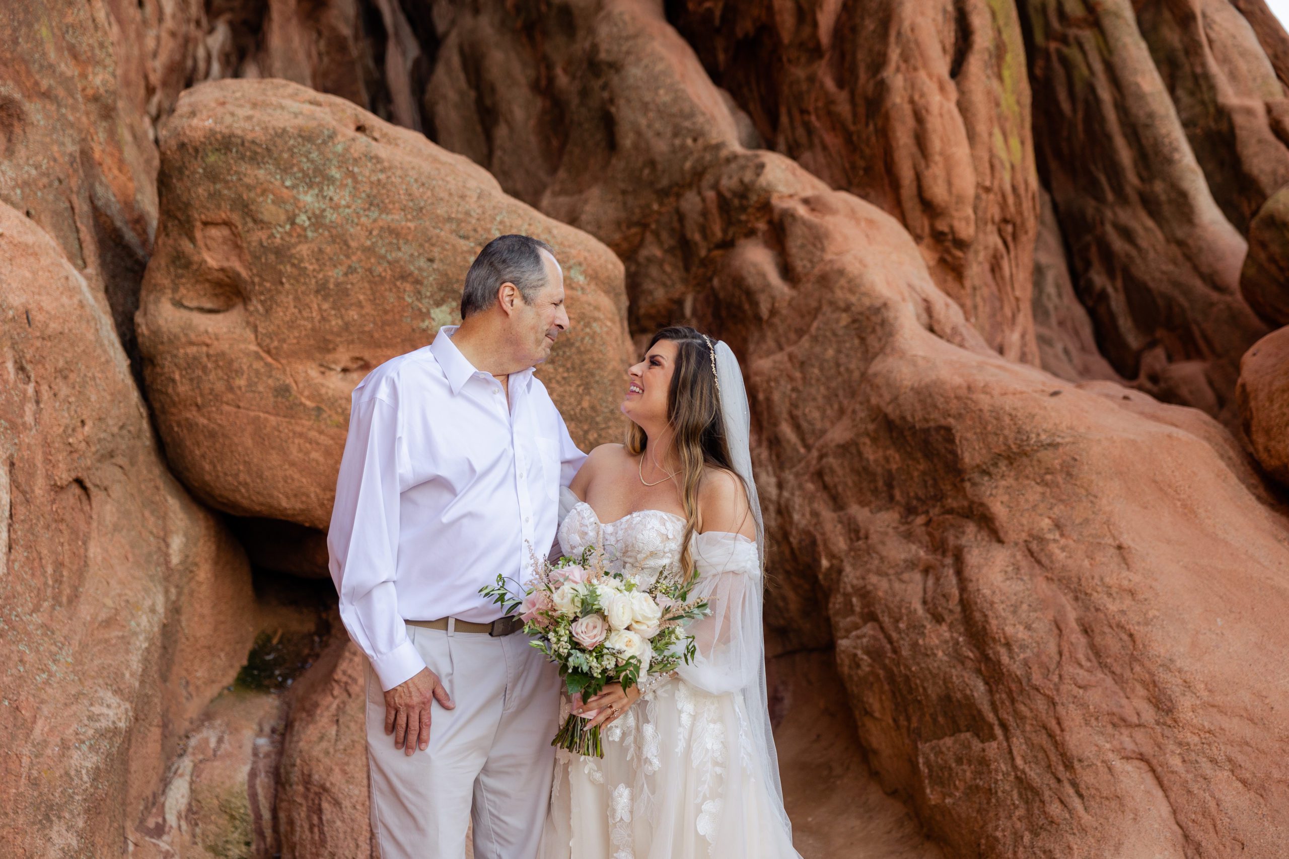 Bride and her father at the garden of the gods. 