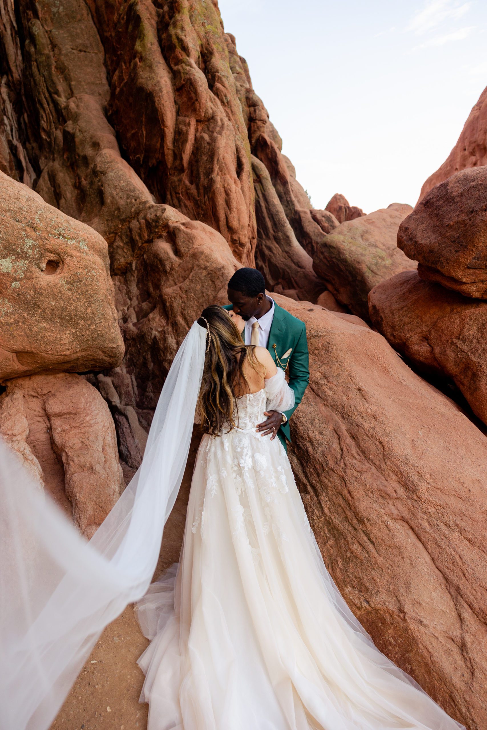 beautiful portrait of the bride and groom after their elopement ceremony at the Garden of the Gods.