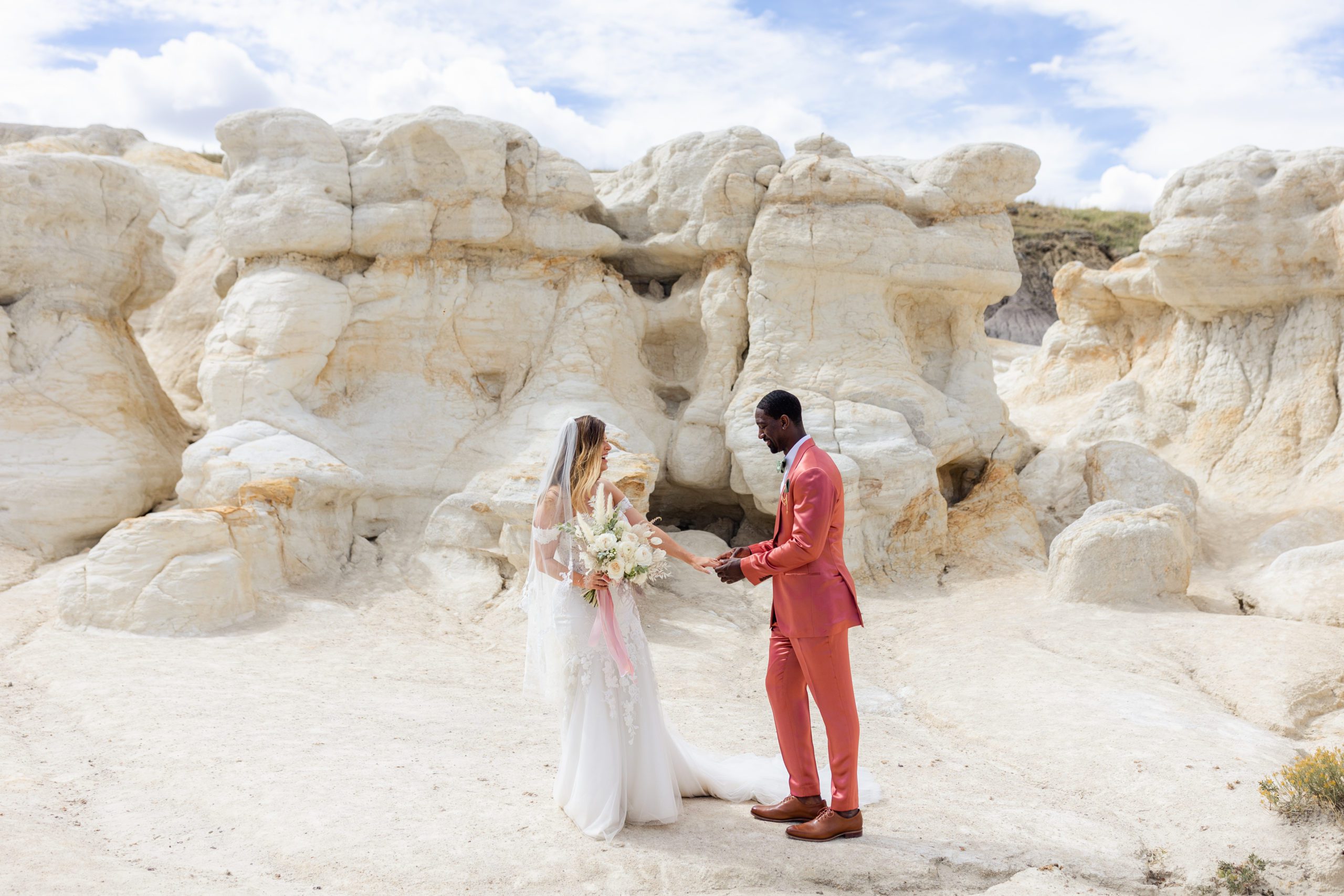 Groom and his bride at the Paint Mines before their elopement at the Garden of the Gods