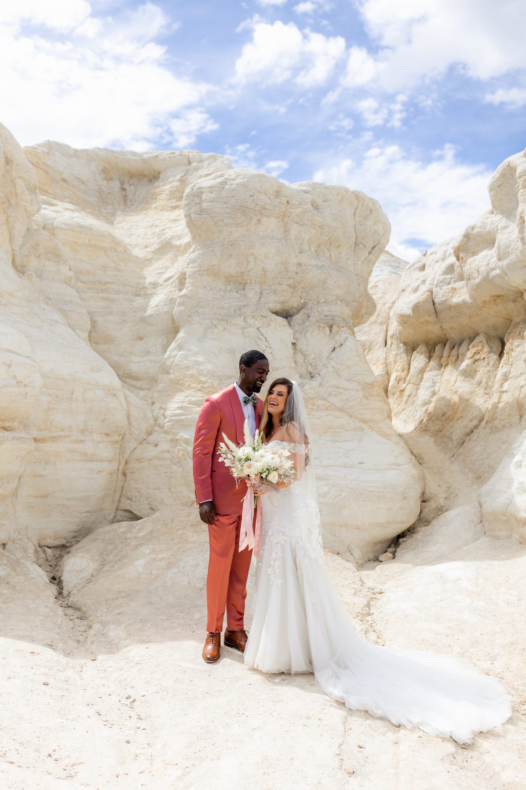 Portrait of the bride and groom at the Paint Mines before their elopement at the Garden of the Gods