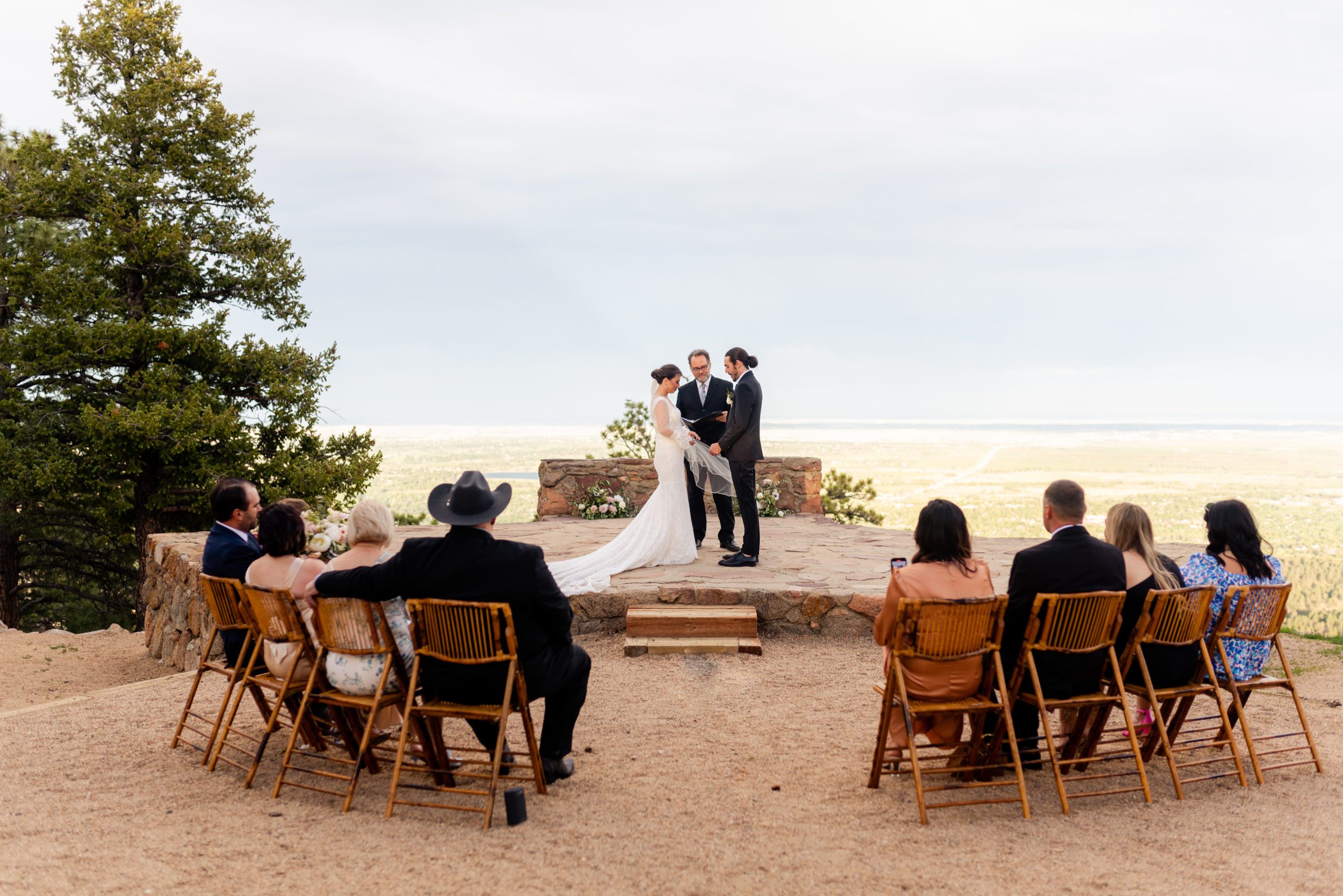An intimate ceremony with guests at Sunrise Amphitheater. 