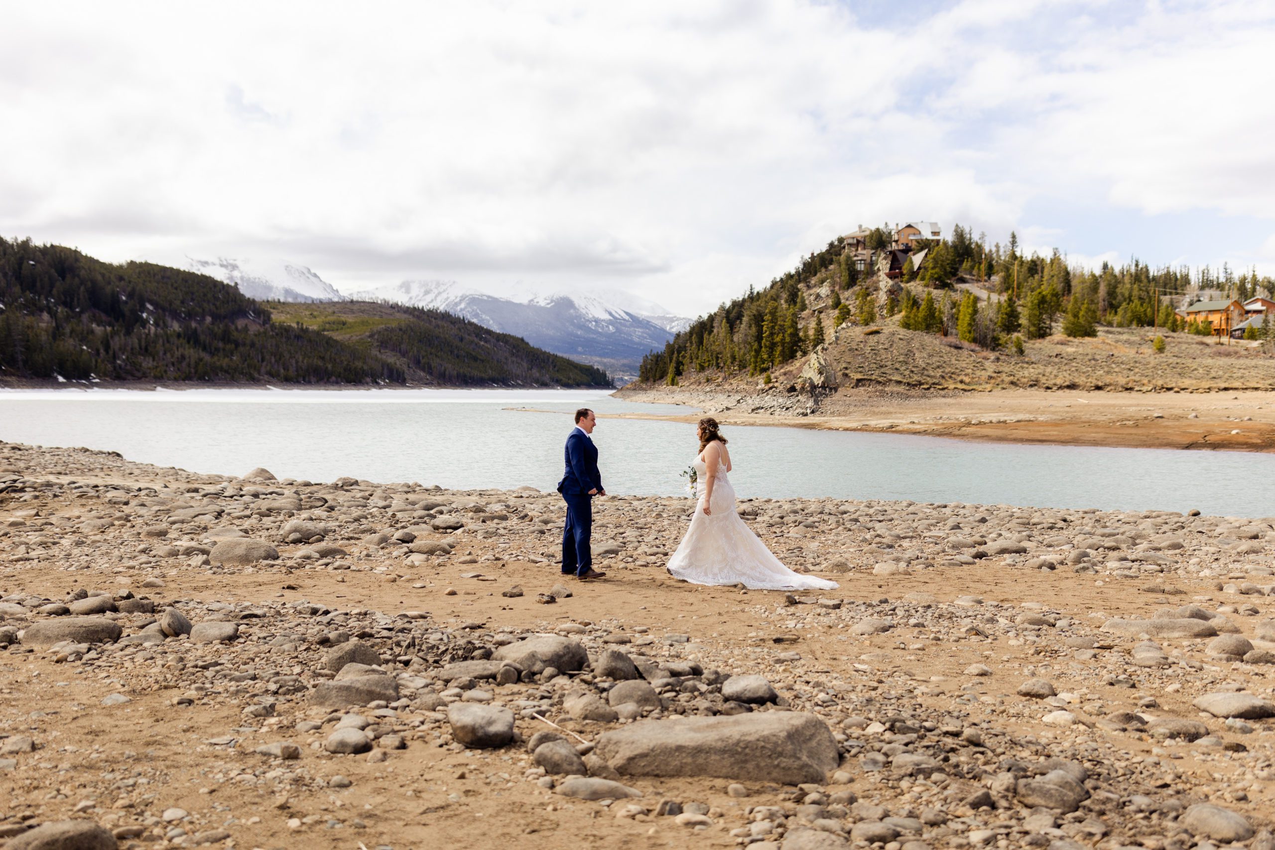 Bride and groom walk towards each other for their first look. Before their Sapphire Point Elopement.