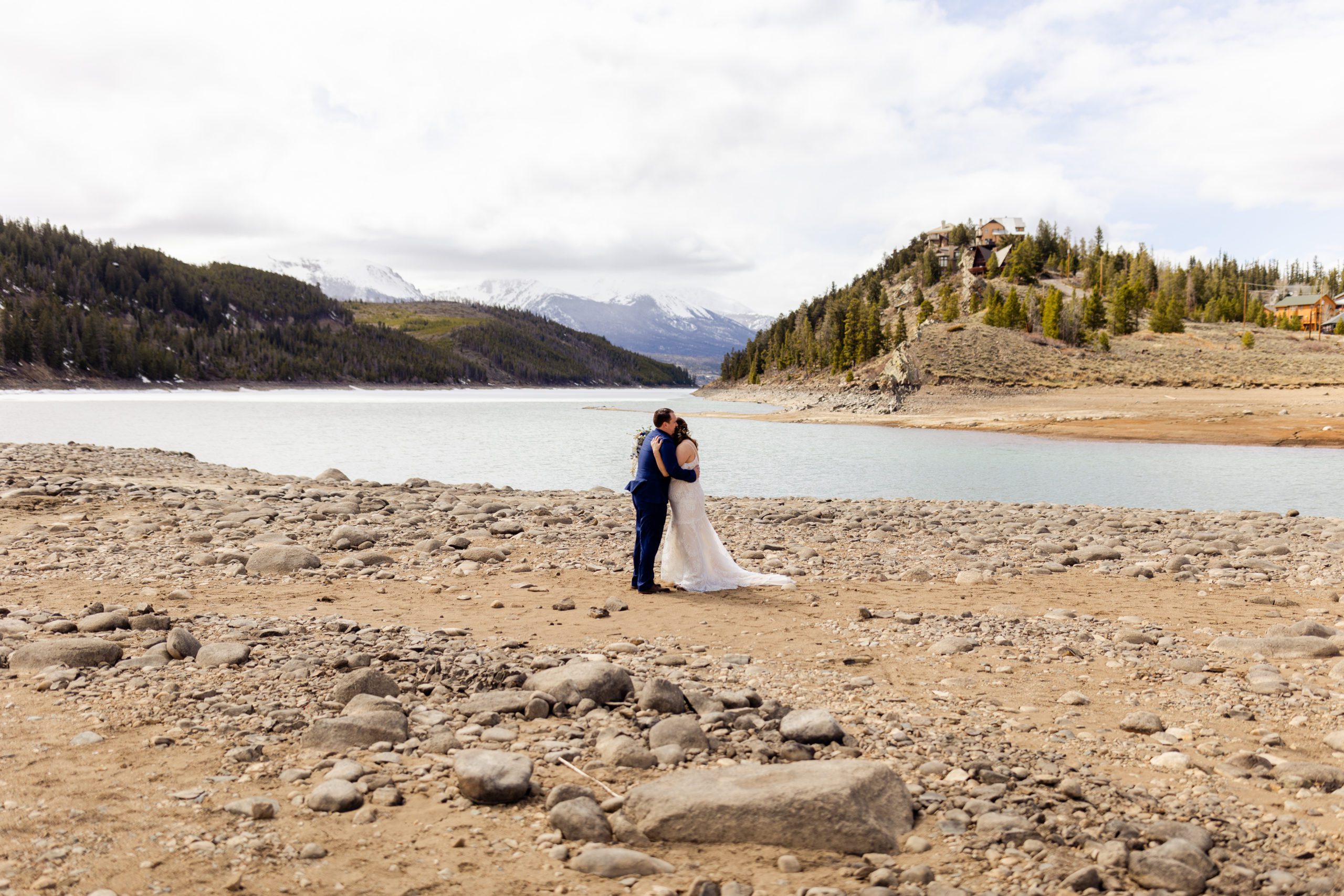 Groom and Bride hug after their first look during their Sapphire Point Elopement.