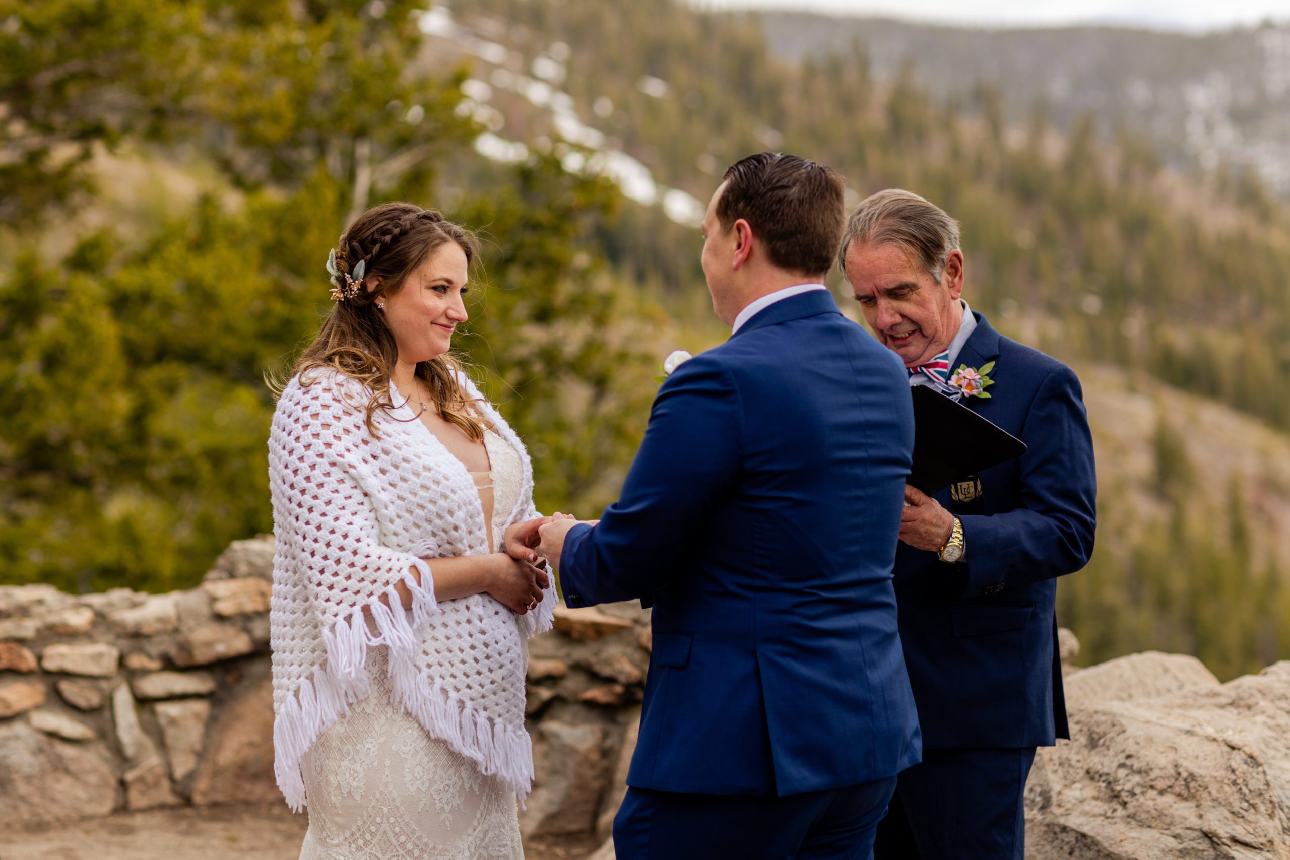 The bride smiles sweetly at her groom during their Sapphire Point Elopement ceremony. 