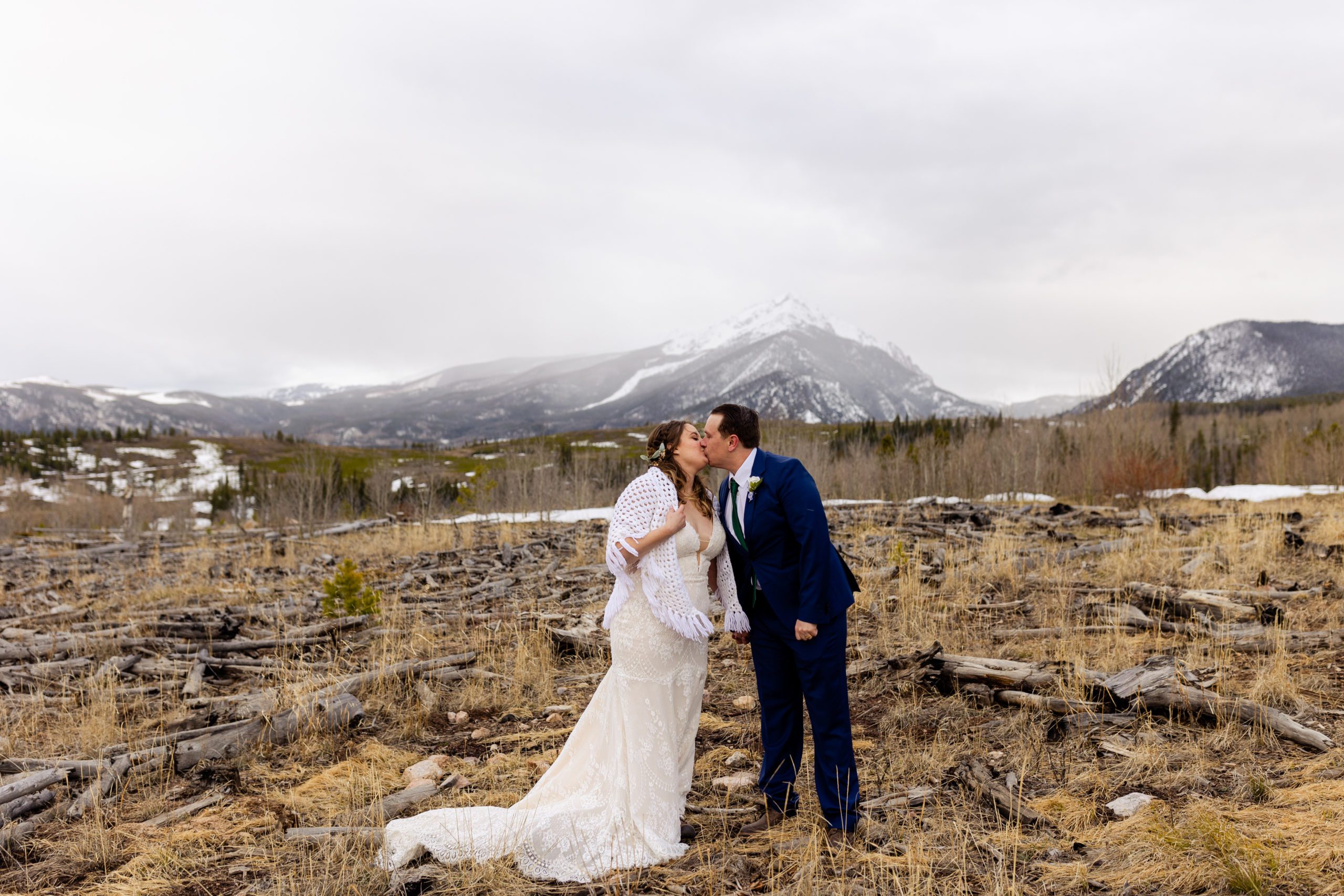 A sweet photo of the bride and groom kissing after their elopement at Sapphire Point. 