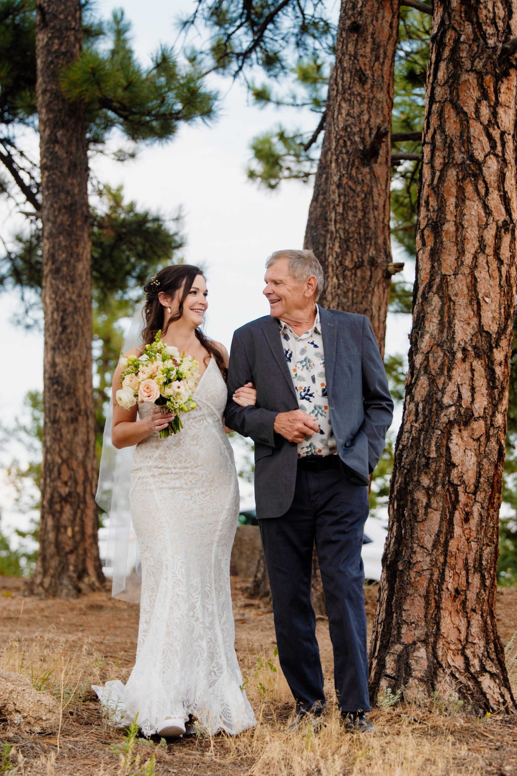 Jaylea's father walks her down the aisle during her Artist Point elopement ceremony.