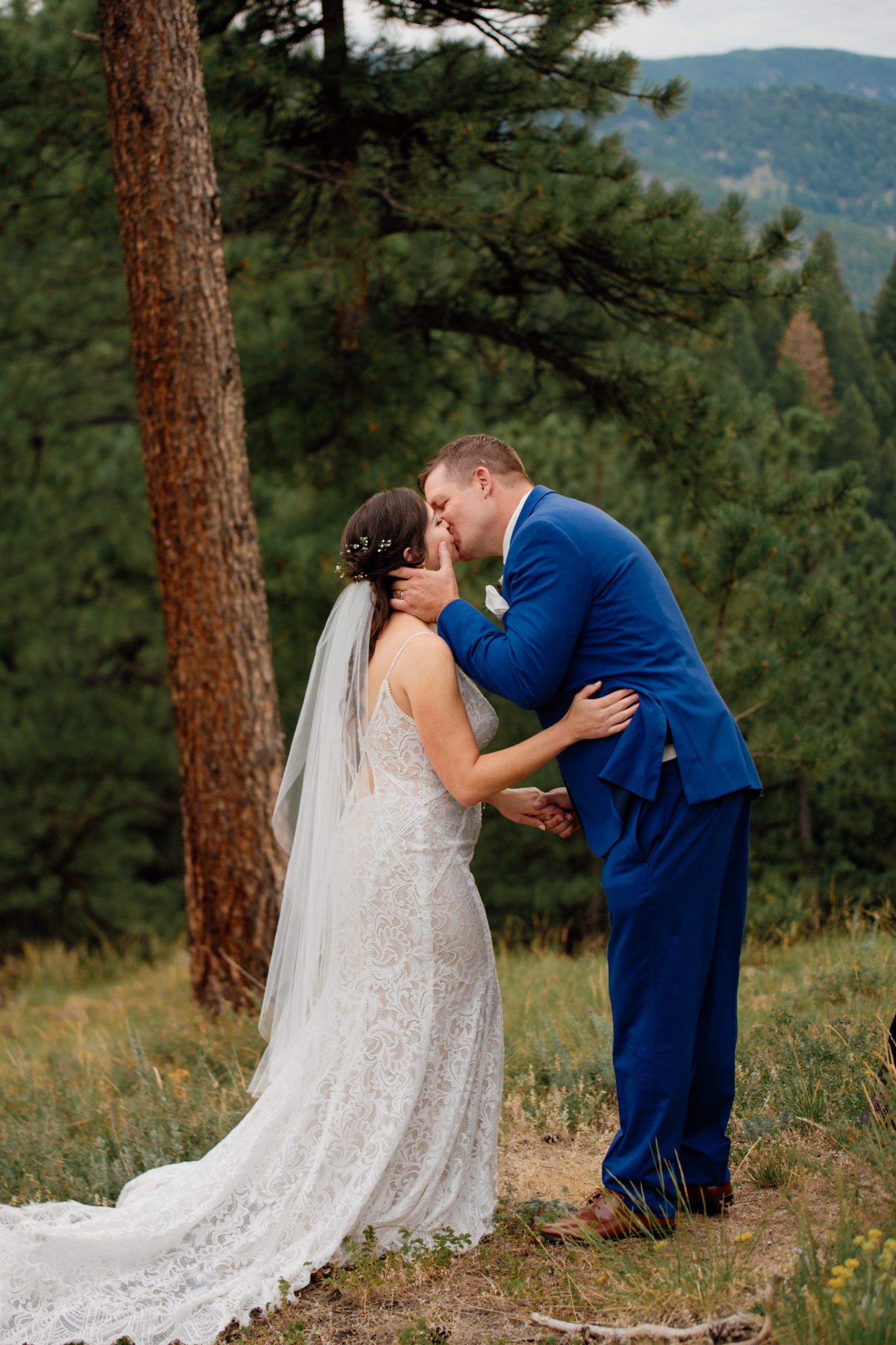 the bride and groom kiss for the first time as husband and wife during their elopement ceremony at Artist Point! 