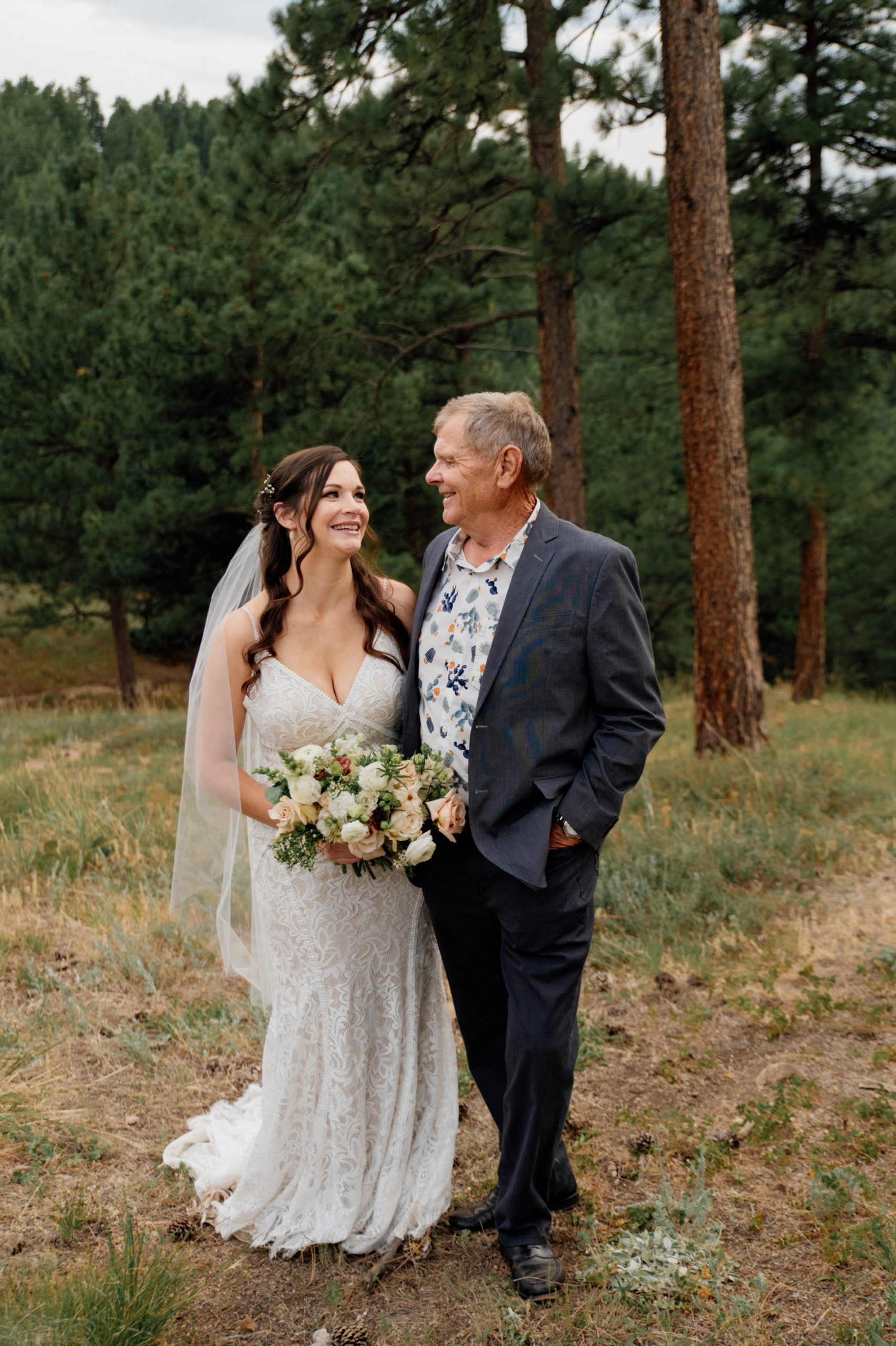 The bride with her father after her artist point elopement 