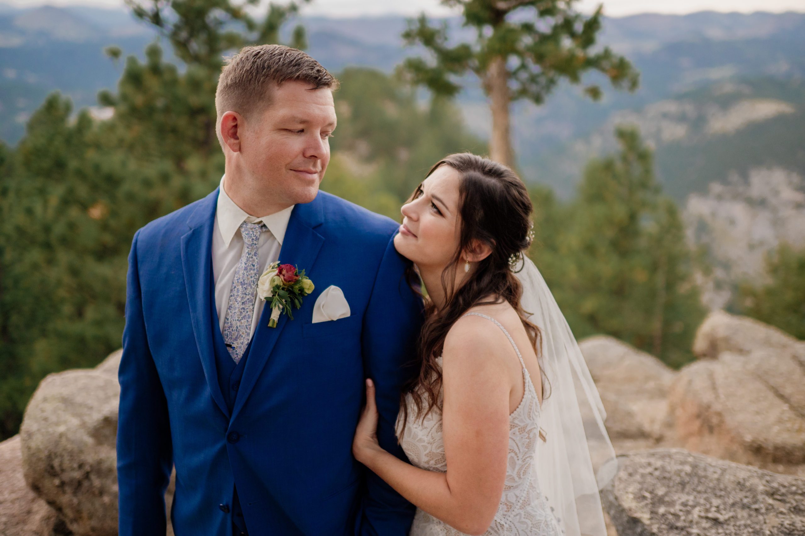 The bride looks lovingly at her husband during their artist point elopement 