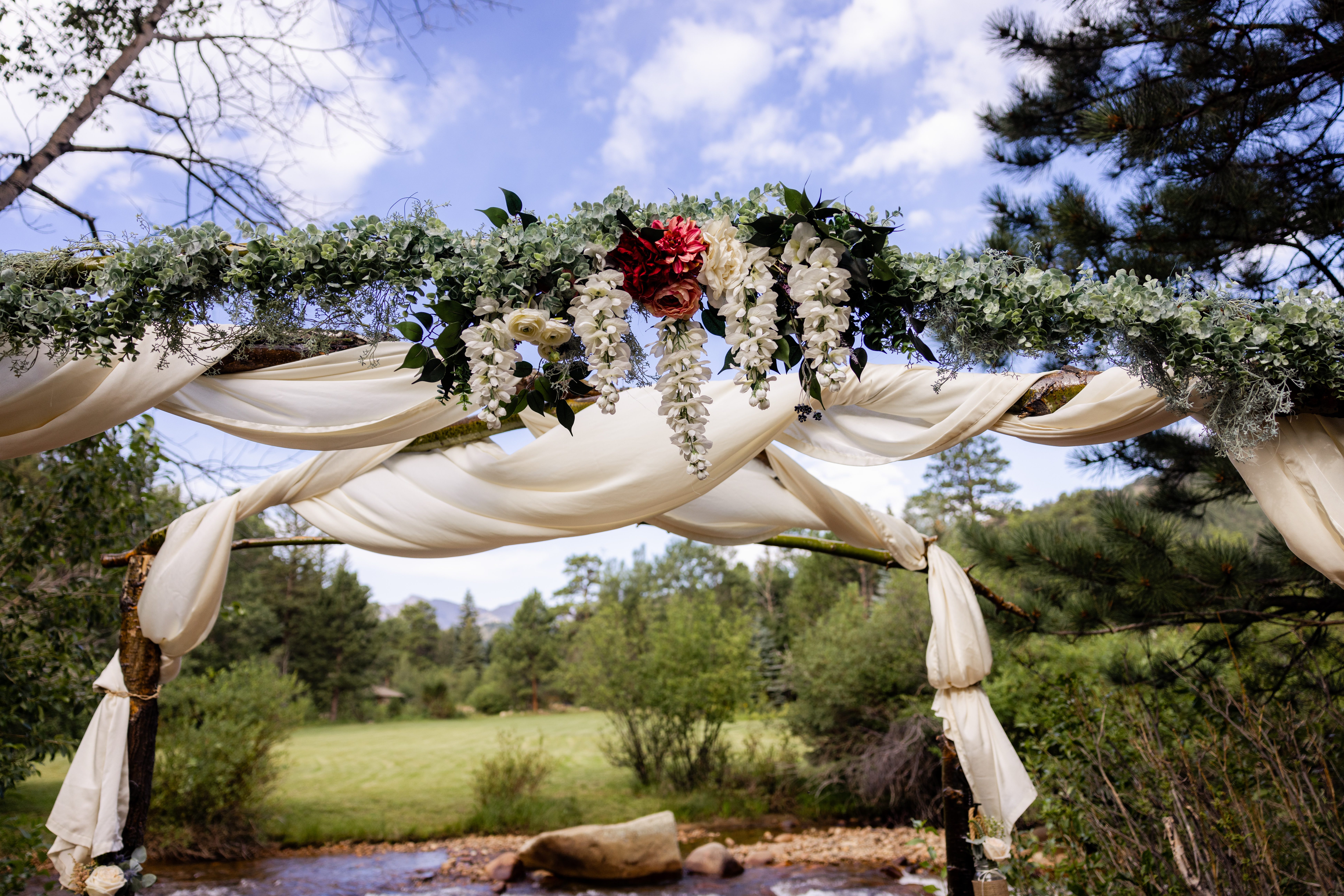 a photo of the beautiful floral archway  at Romantic RiverSong Inn in Estes Park. 