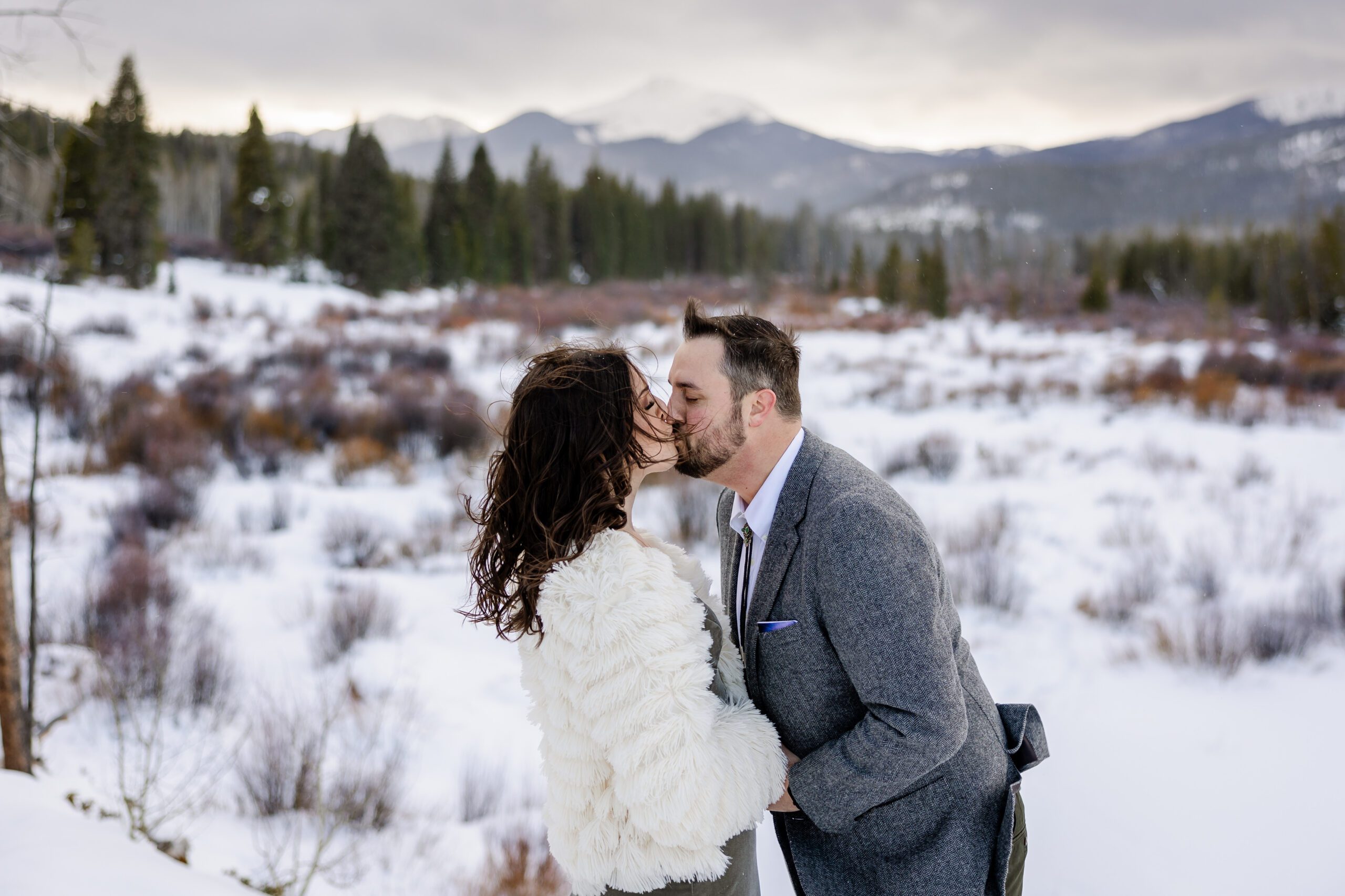 bride and groom kissing, to make it official! At their Winter Park elopement ceremony. 