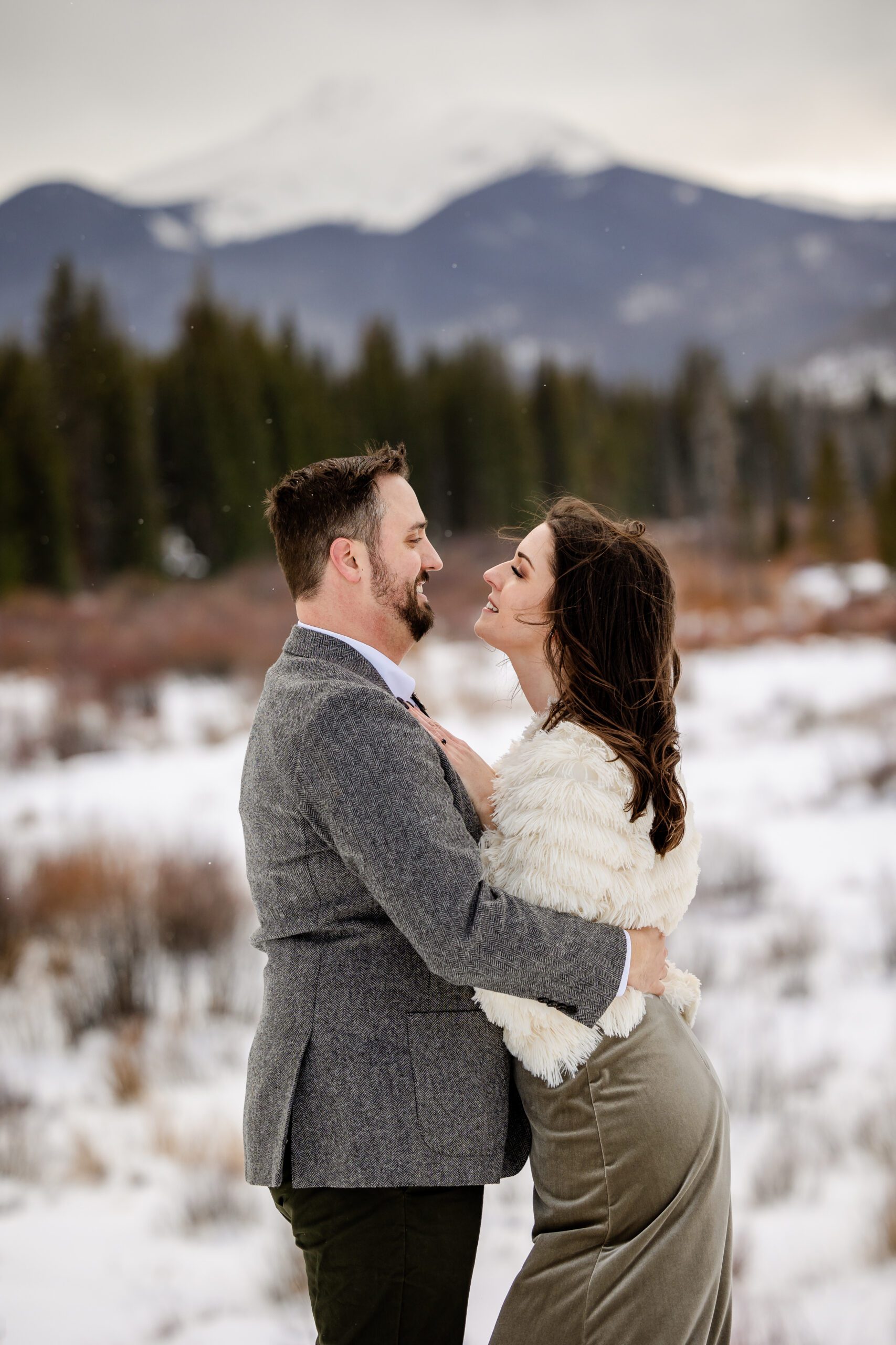 bride and groom looking in each others eyes, smiling at their Winter Park elopement.