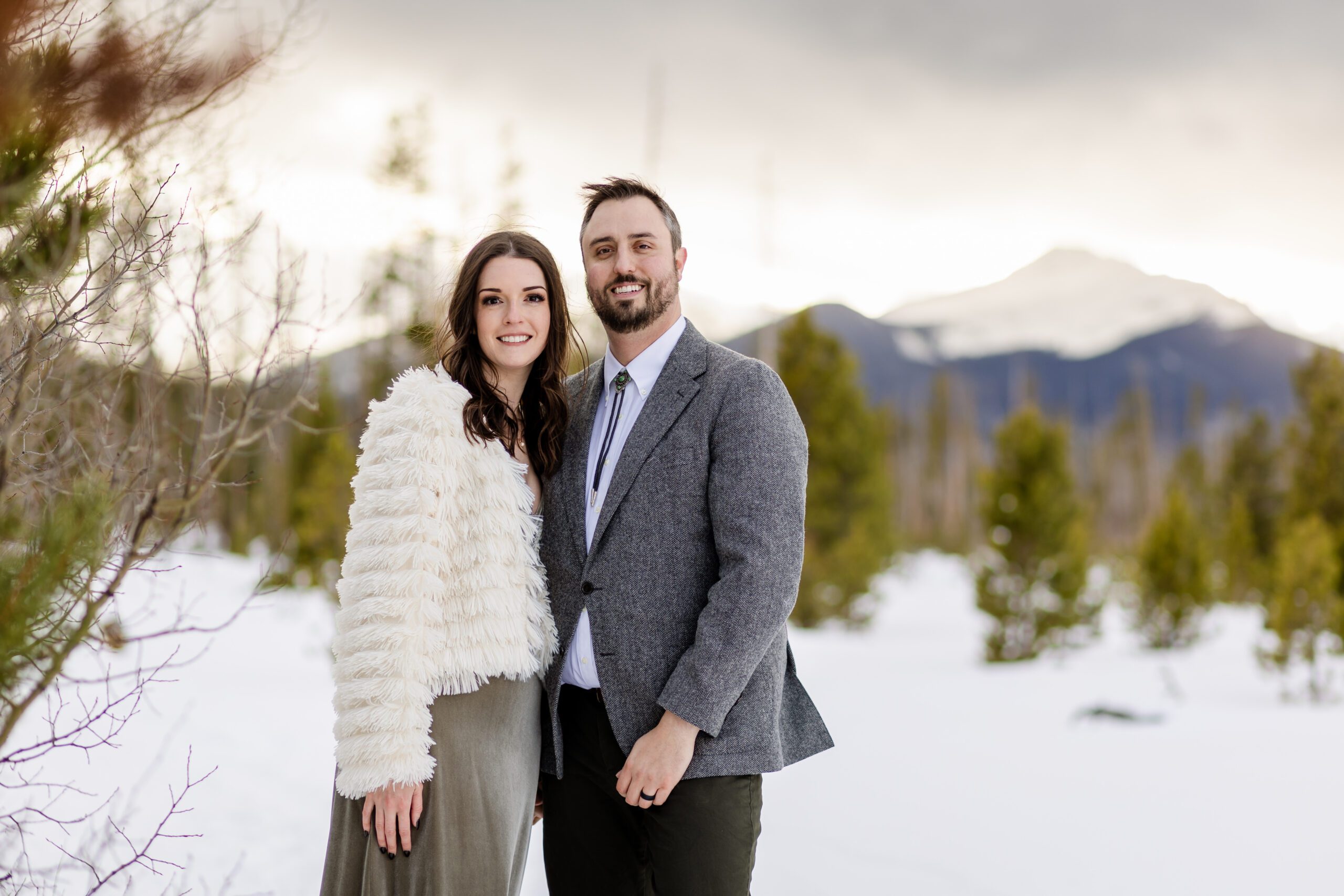 the bride and groom looking at the camera smiling at their Winter Park elopement.
