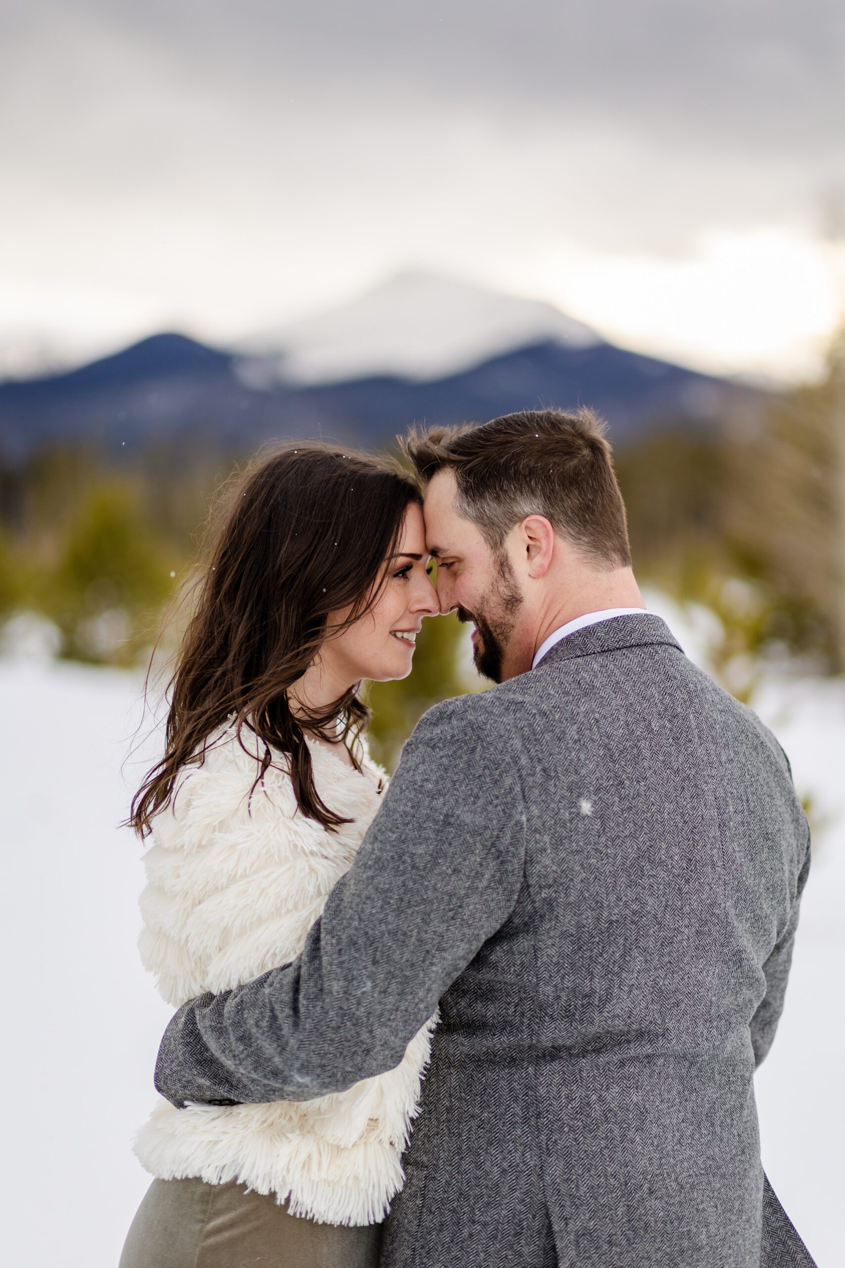 the bride and groom smiling at each other during their Winter Park elopement.