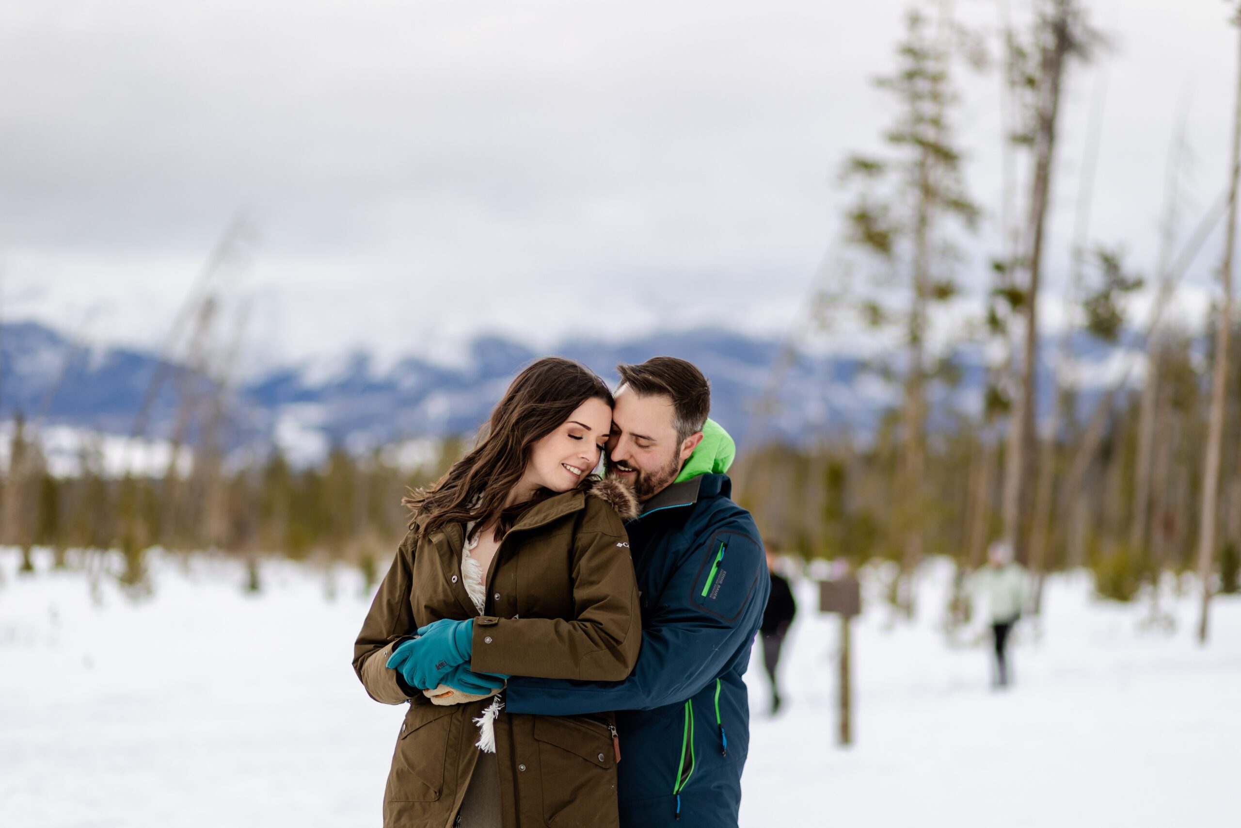 the bride and groom in their winter jackets at their Winter Park elopement.