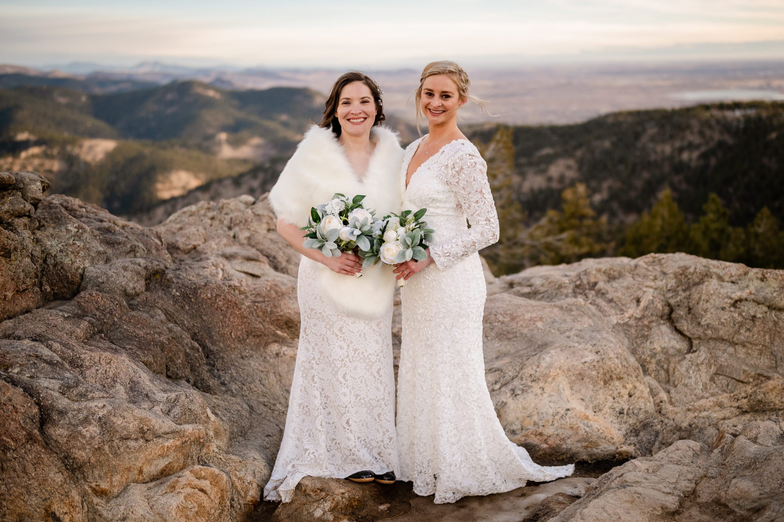 The bride's holding beautiful bouquets at their Lost Gulch elopement.