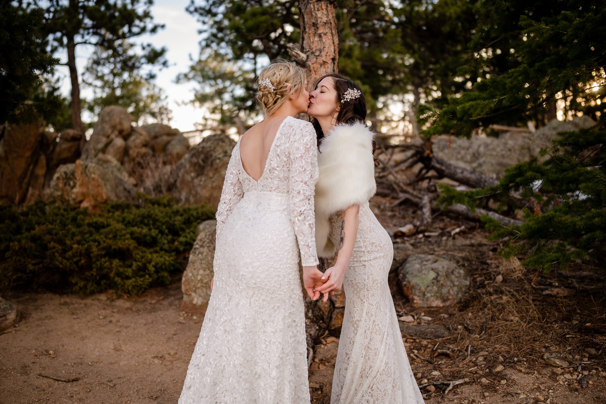 The brides kissing at their Lost Gulch elopement. 