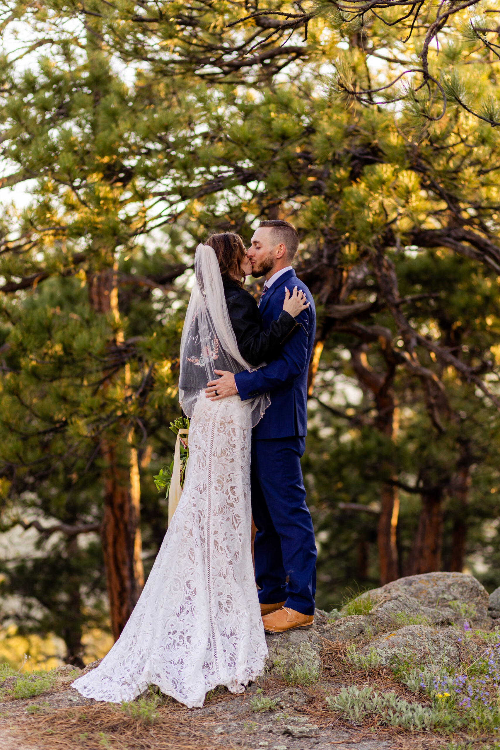 the bride and groom kissing after their Sunrise Amphitheater elopement ceremony. 