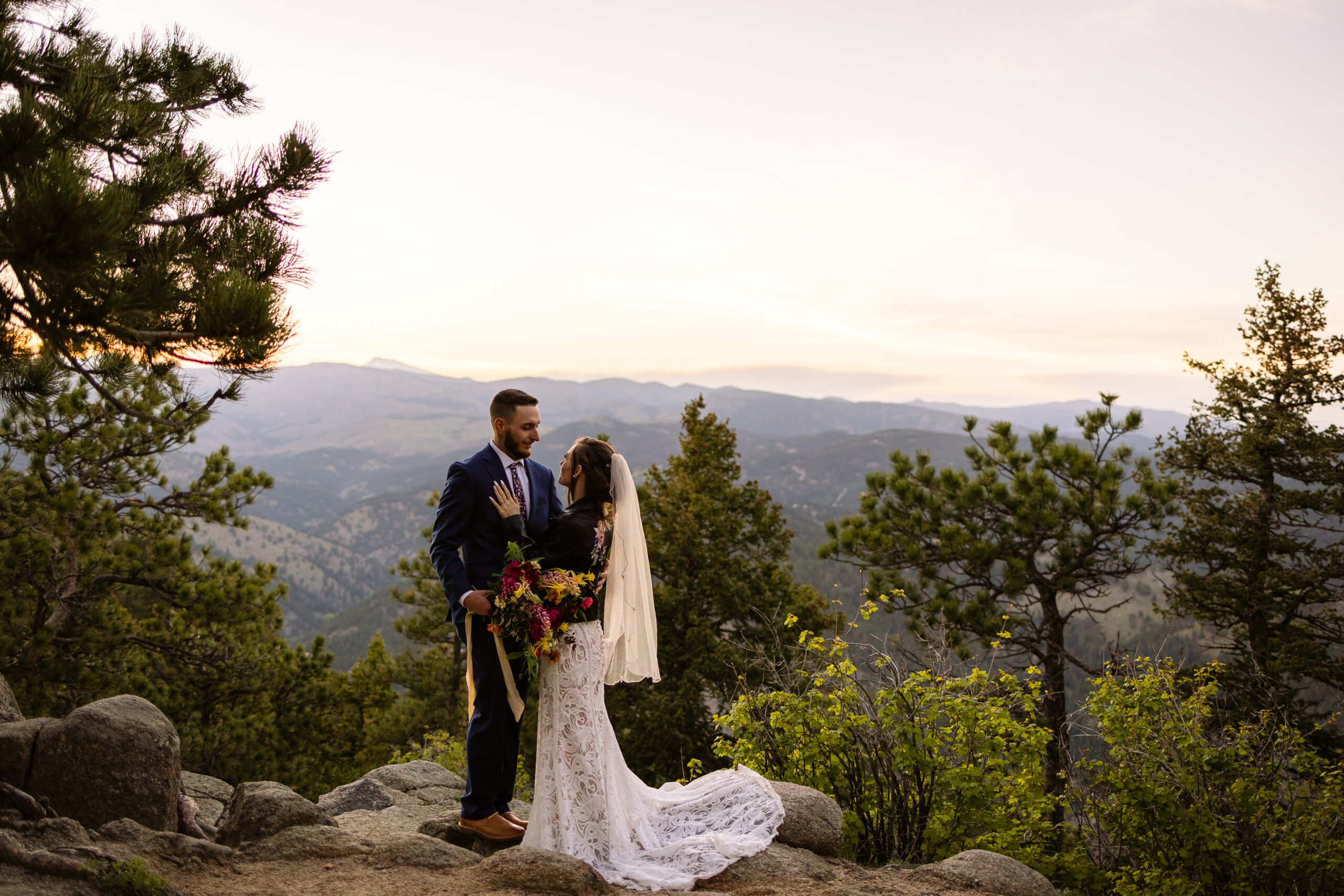 A beautiful shot of the bride and groom as the sunsets  at Artist Point after their Sunrise Amphitheater elopement ceremony. 