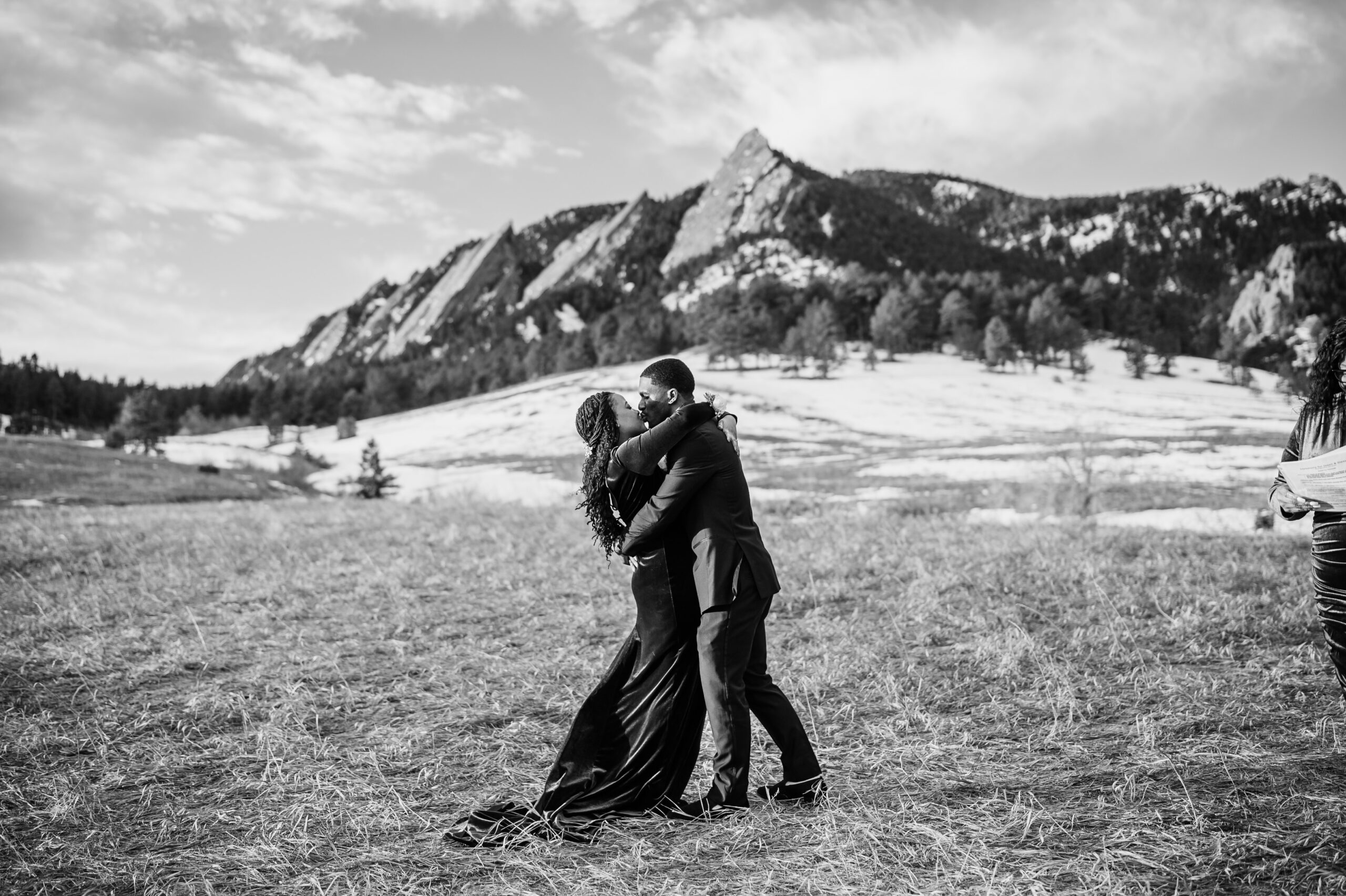 a black and white photo of the bride and groom kissing at their Chautauqua Trail elopement. 