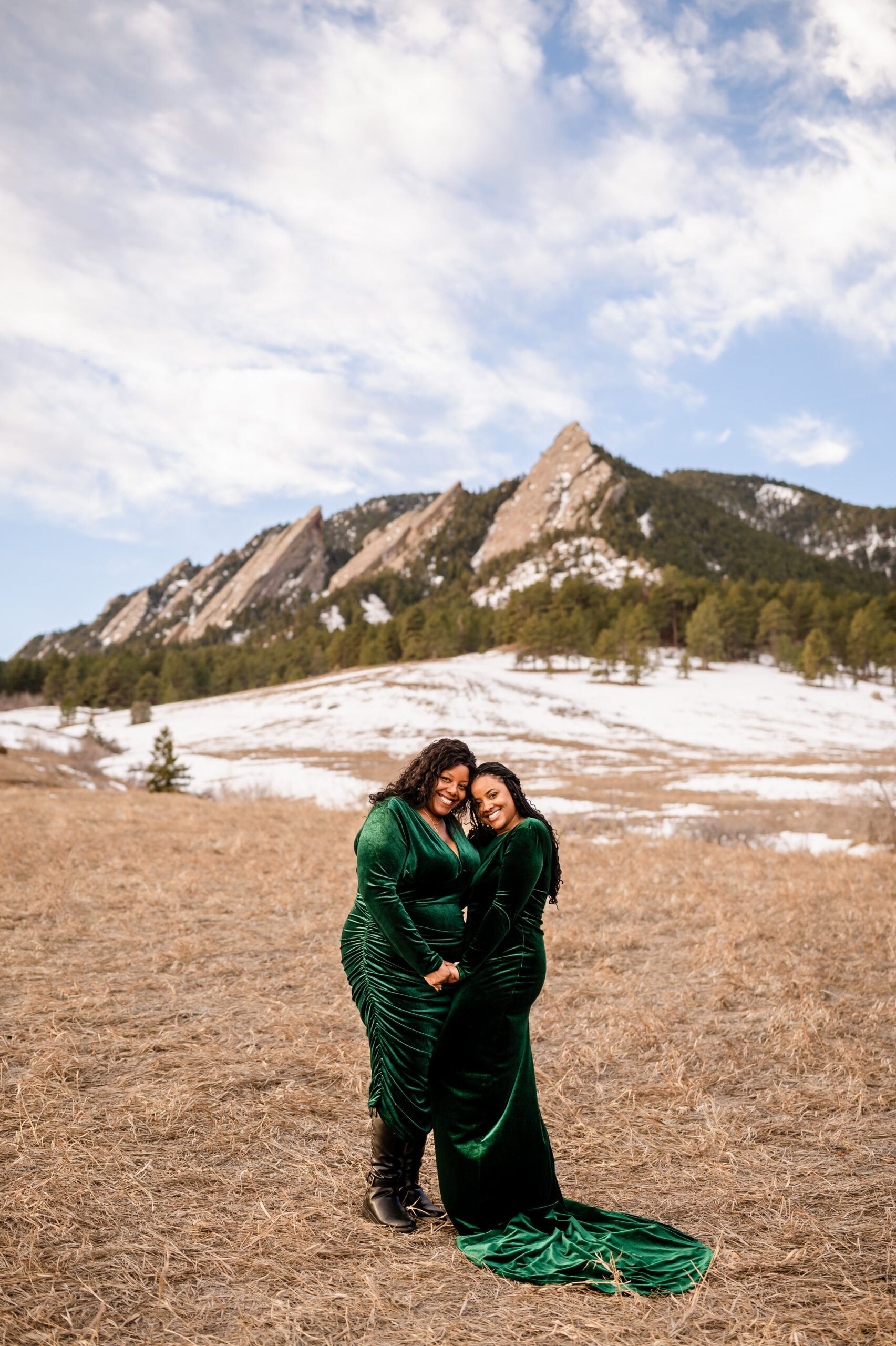 the bride and her mother wearing gorgeous green dresses after their Chautauqua Trail elopement. 